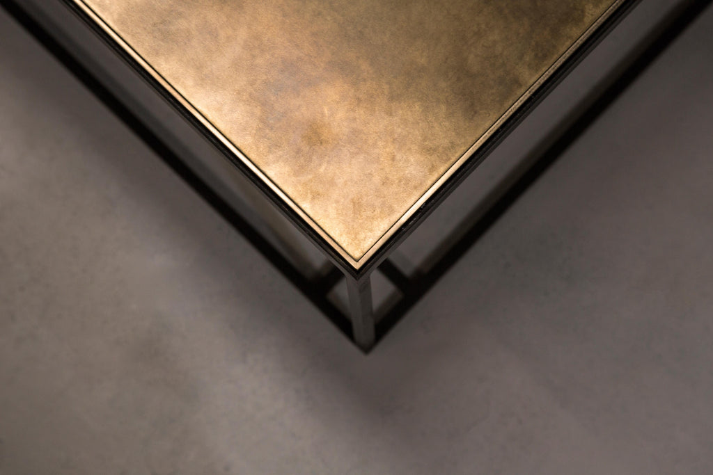 https://a.1stdibscdn.com/binate-coffee-table-extra-large-blackened-steel-frame-patinated-brass-top-for-sale-picture-4/f_25883/f_272126821645089772279/NOVOCASTRIAN_Brass_Binate_Large_5_master.jpg