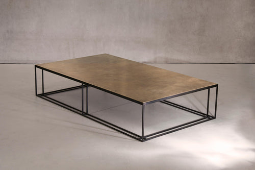 https://a.1stdibscdn.com/binate-coffee-table-extra-large-blackened-steel-frame-patinated-brass-top-for-sale-picture-2/f_25883/f_272126821645089892999/NOVOCASTRIAN_Brass_Binate_Large_master.jpg
