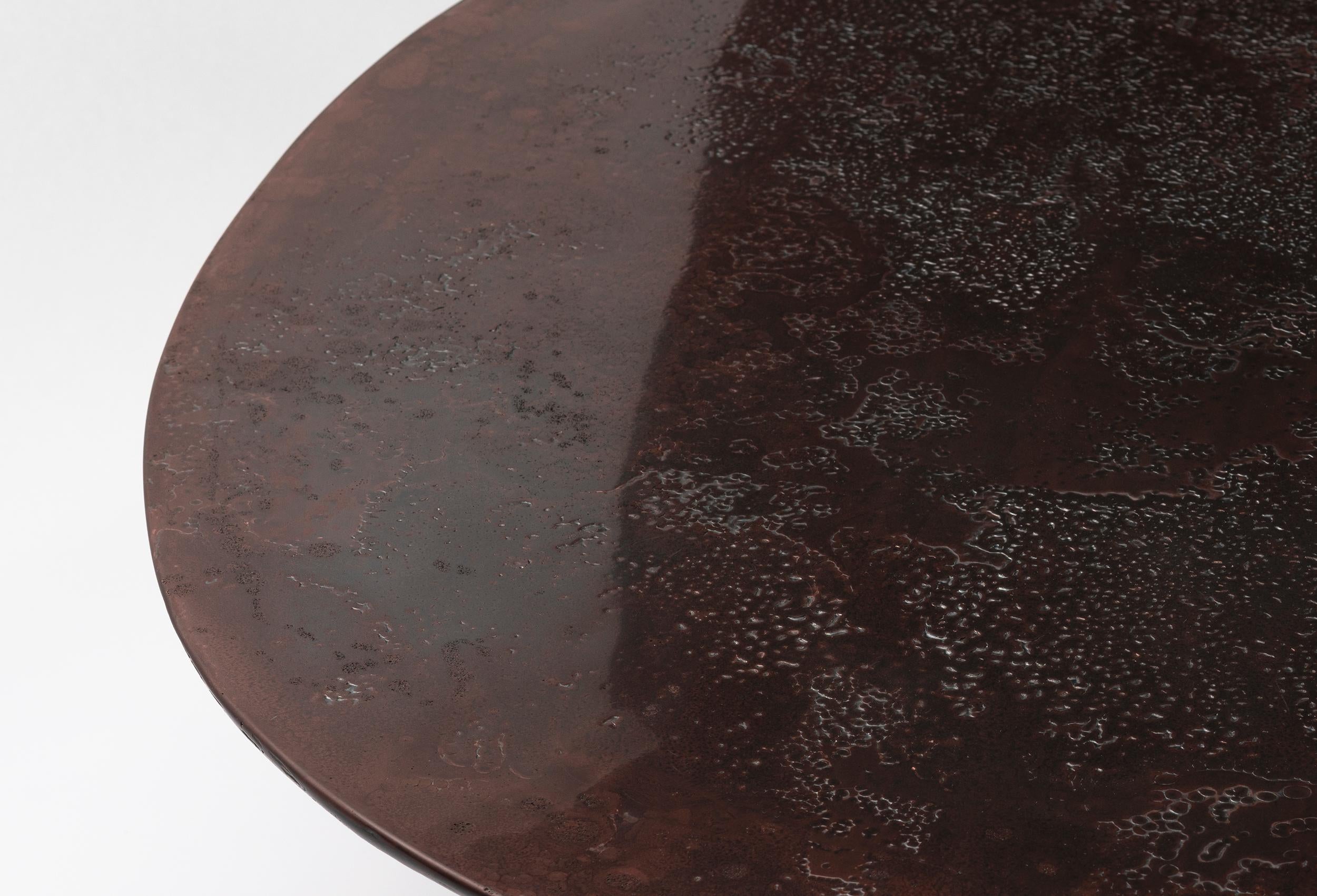 https://a.1stdibscdn.com/nr-copper-v2-21st-century-sculptured-liquid-oxidized-copper-oval-coffee-table-for-sale-picture-8/f_55762/1617095528632/NR_Copper_Table_V2_Detail_1_master.jpg