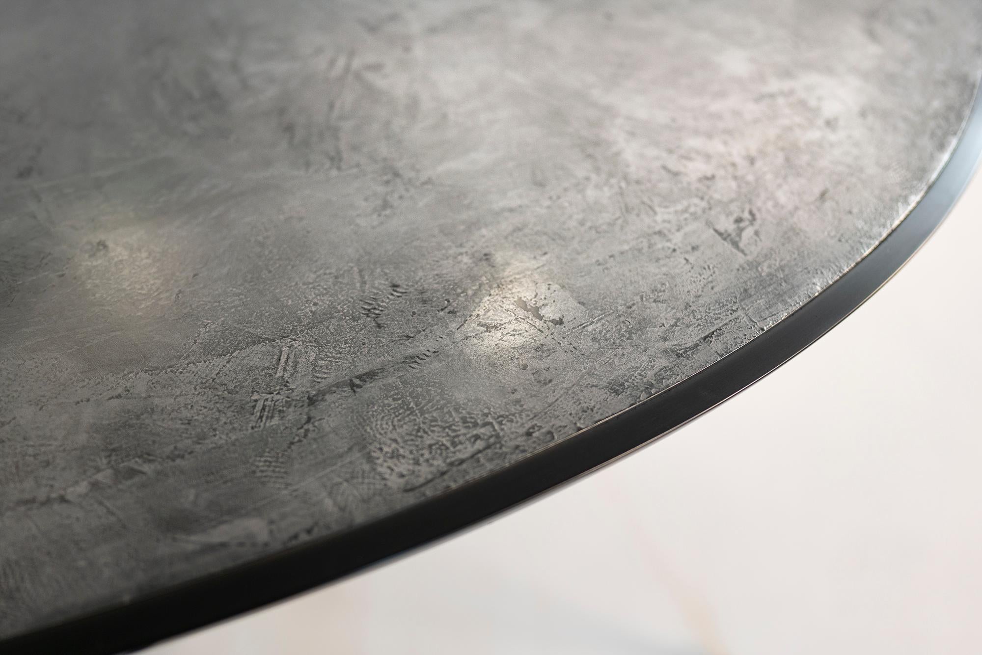 https://a.1stdibscdn.com/nr-21st-century-european-black-circular-custom-made-contemporary-dining-table-for-sale-picture-7/f_55762/f_224522921613380330768/NR_Dining_Table_1_Detail_master.jpg