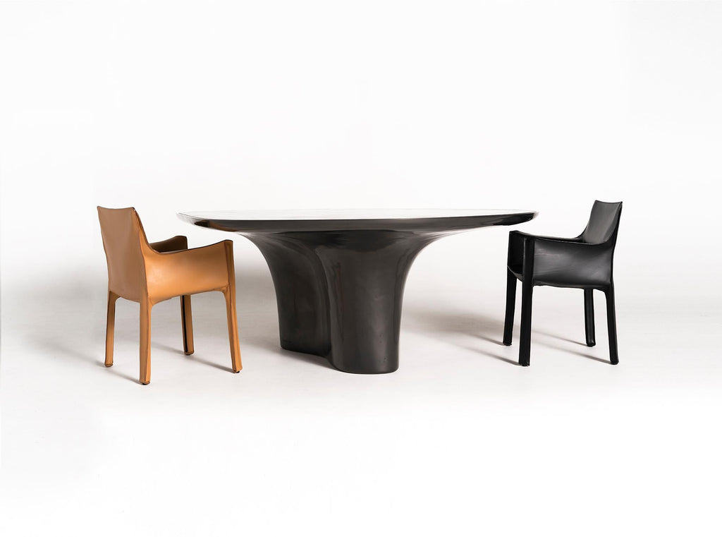 https://a.1stdibscdn.com/nr-21st-century-european-black-circular-custom-made-contemporary-dining-table-for-sale-picture-5/f_55762/f_224522921613380313030/NR_Dining_Table_5_master.jpg