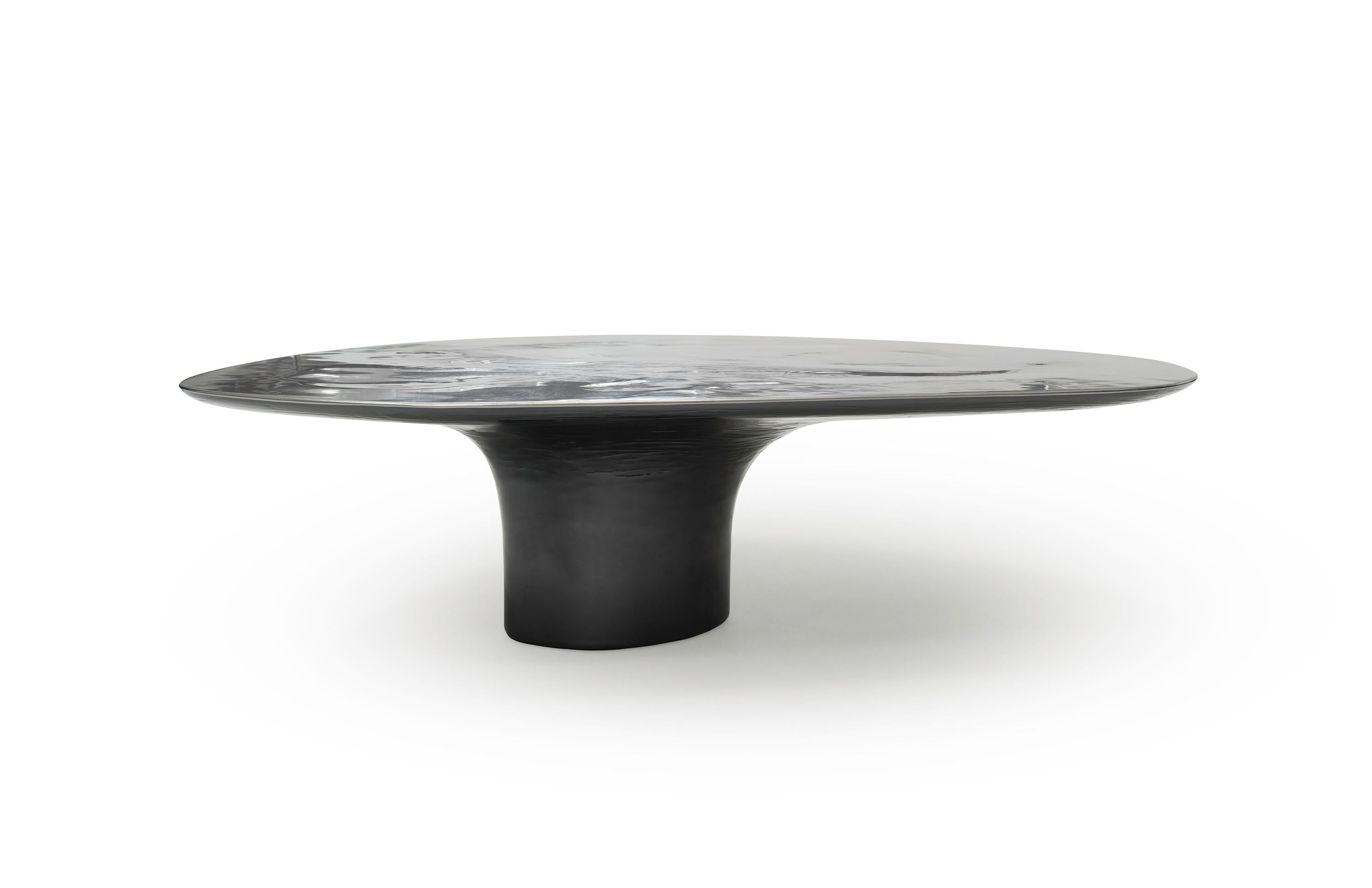 https://a.1stdibscdn.com/nr-low-21st-century-modern-sculptural-circular-silver-black-coffee-table-for-sale-picture-5/f_55762/1613998094872/NR_low_table_1_1_of_1_2_2_master.jpg