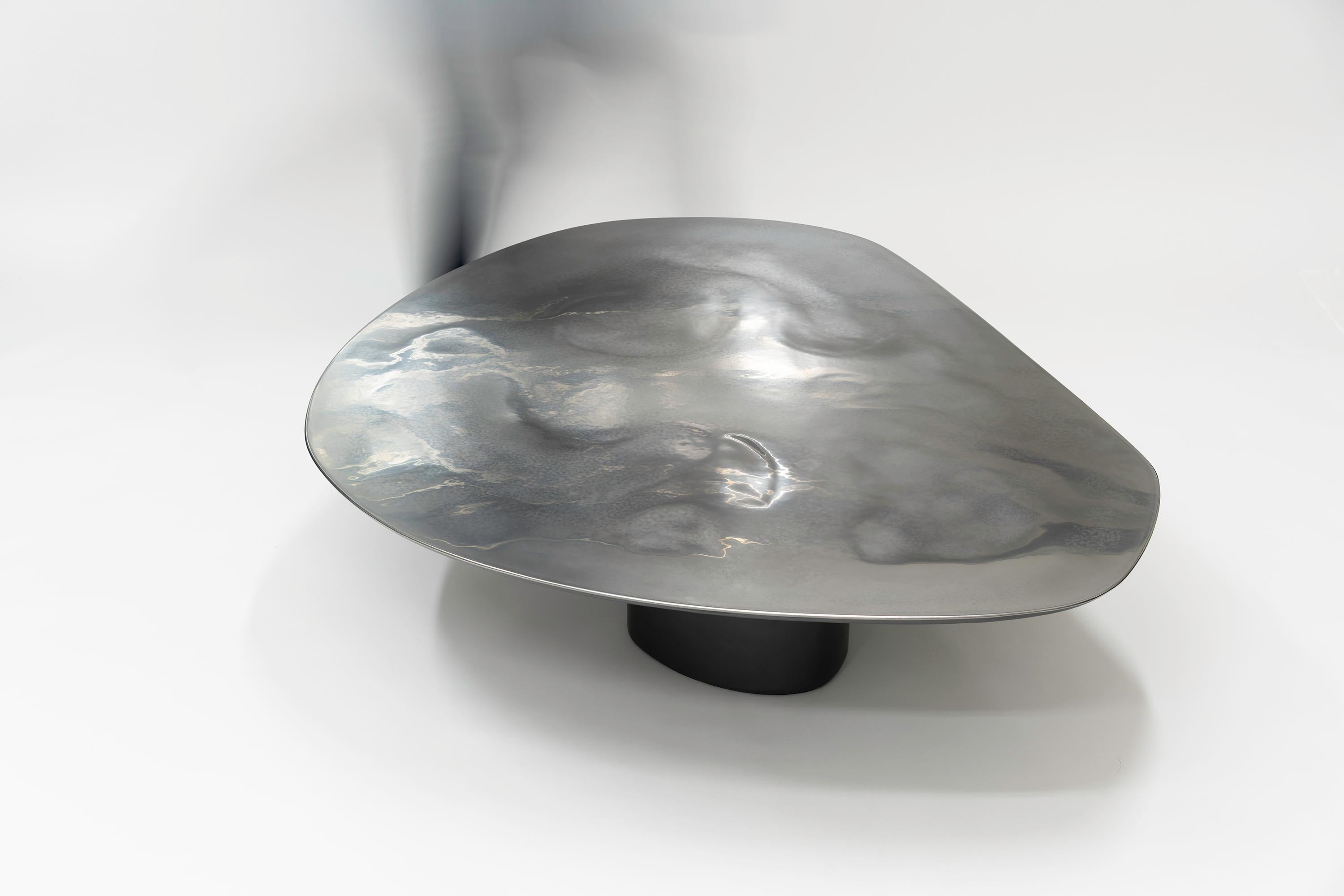 https://a.1stdibscdn.com/nr-low-21st-century-modern-sculptural-circular-silver-black-coffee-table-for-sale-picture-6/f_55762/1613998097058/NR_low_table_1_1_of_1_2_3_master.jpg