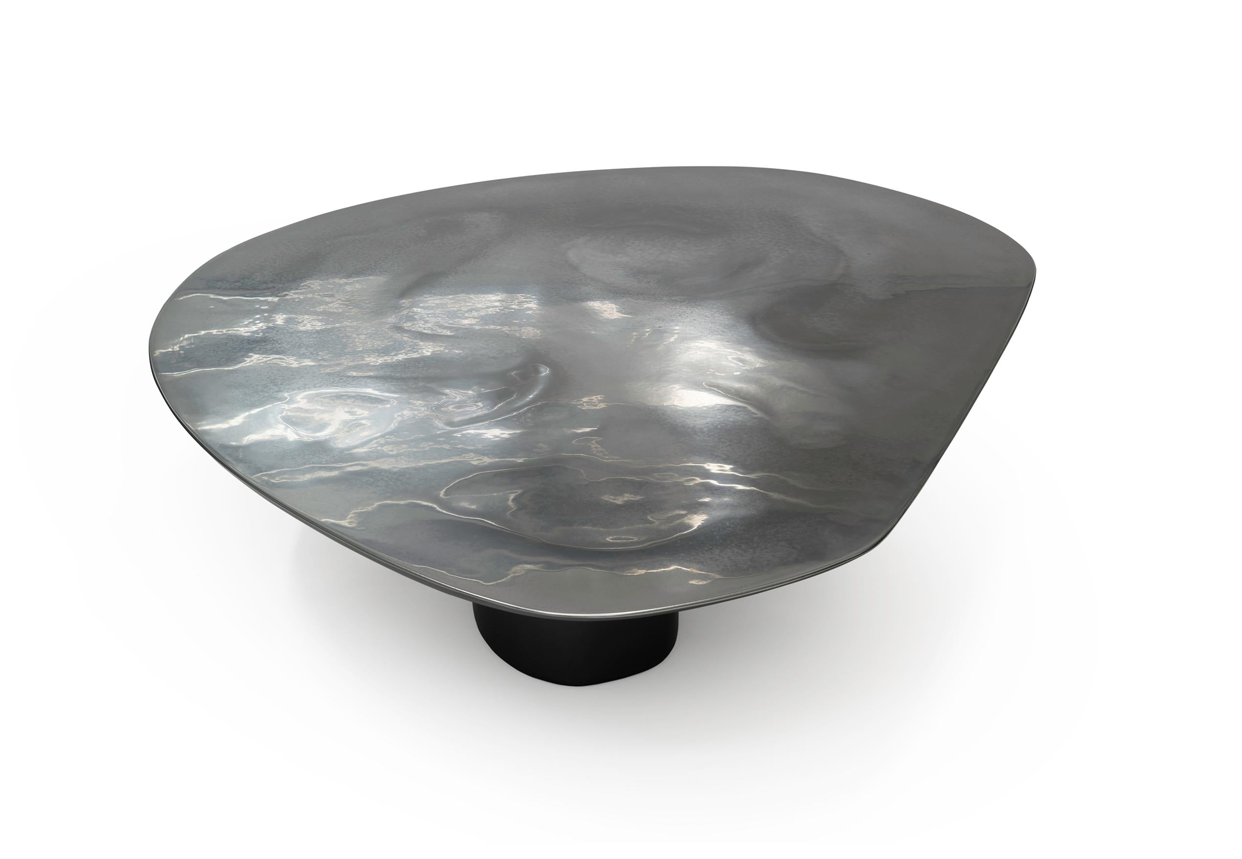 https://a.1stdibscdn.com/nr-low-21st-century-modern-sculptural-circular-silver-black-coffee-table-for-sale-picture-2/f_55762/1613998089351/NR_low_table_1_of_1_5_master.jpg