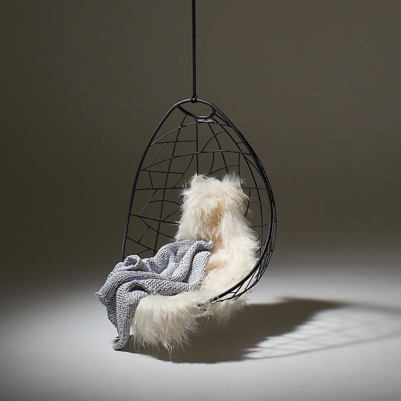 https://a.1stdibscdn.com/nest-egg-hanging-swing-chair-for-sale-picture-11/f_32773/f_95535731574259284971/Nest_Egg_Icelandic_Sheepskin_blanket_grey_master.jpg