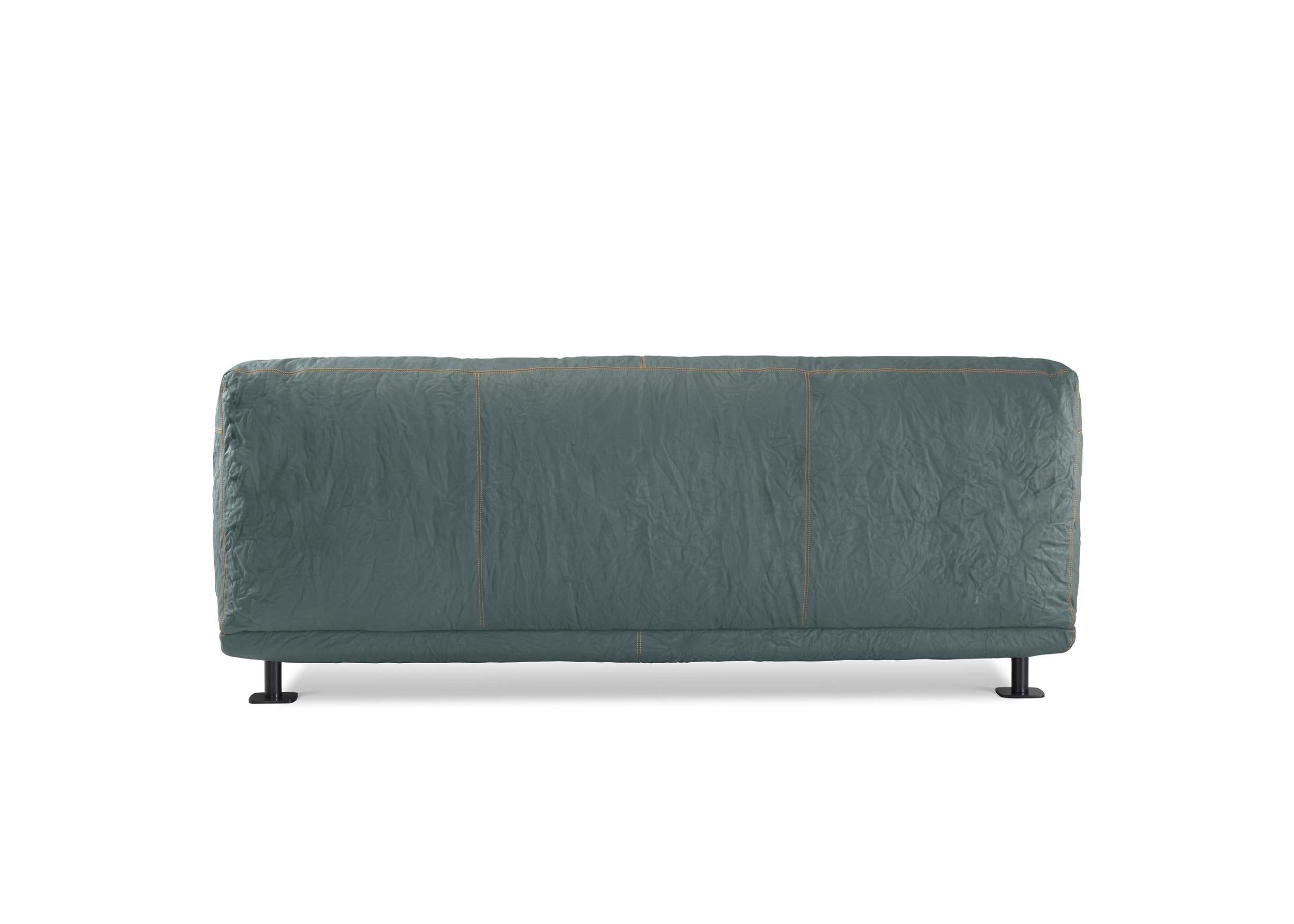 https://a.1stdibscdn.com/newcastle-202-leather-sofa-in-fiord-mustard-by-giulio-iacchetti-for-sale-picture-2/56838172/f_445317521744725328158/Newcastle_202_Leather_Sofa_in_Fiord_Mustard_by_Giulio_Iacchetti_2_master.jpg