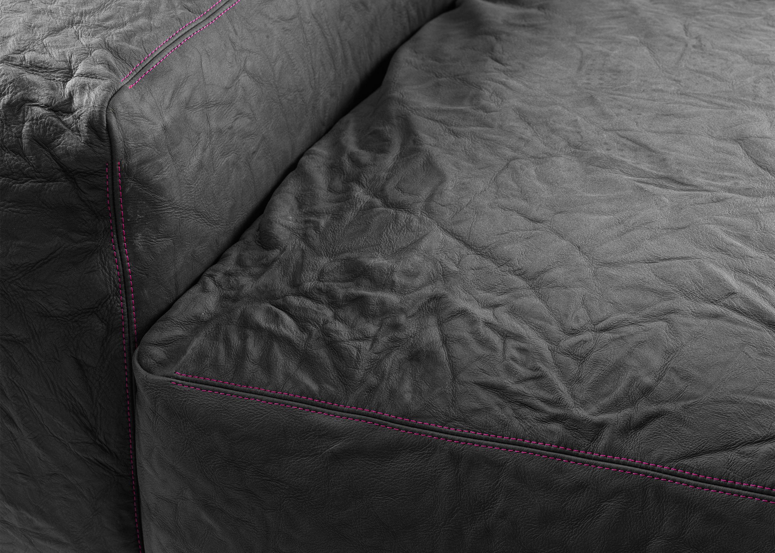 https://a.1stdibscdn.com/newcastle-232-leather-sofa-slate-magenta-by-giulio-iacchetti-for-sale-picture-5/56838172/f_445317821744725473683/Newcastle_232_Leather_Sofa_Slate_Magenta_by_Giulio_Iacchetti_5_master.jpg