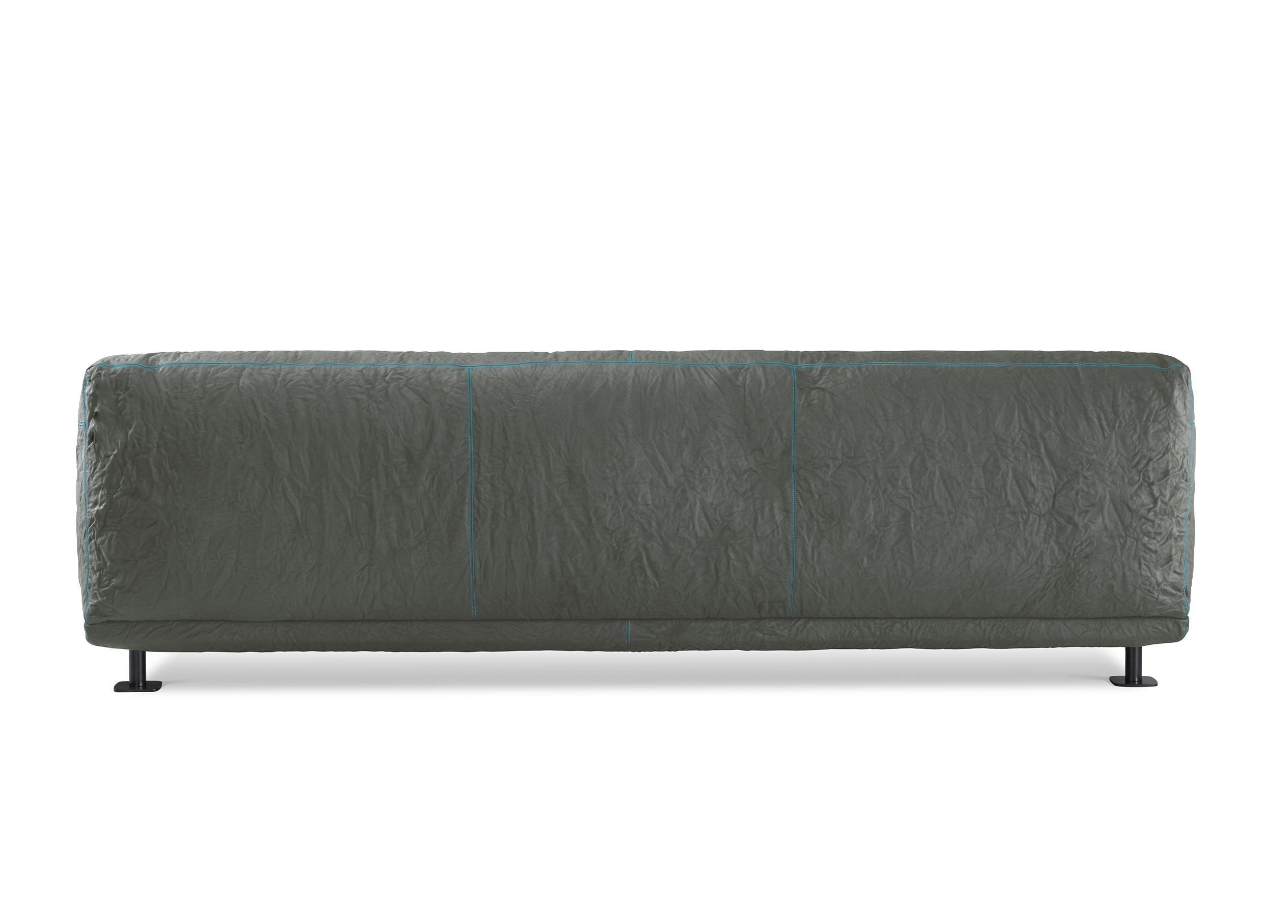 https://a.1stdibscdn.com/newcastle-262-leather-sofa-ash-cyan-by-giulio-iacchetti-for-sale-picture-2/56838172/f_445318321744725558028/Newcastle_262_Leather_Sofa_Ash_Cyan_by_Giulio_Iacchetti_2_master.jpg