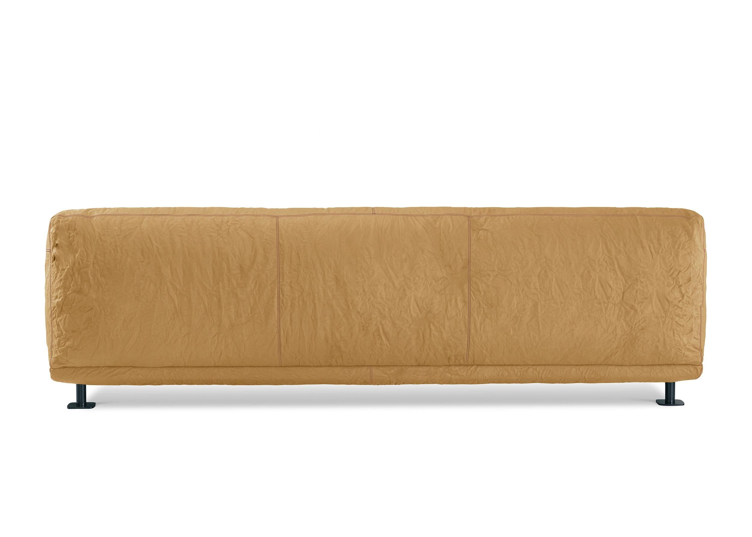 https://a.1stdibscdn.com/newcastle-262-leather-sofa-kraft-bordeaux-by-giulio-iacchetti-for-sale-picture-2/56838172/f_445318521744725606111/Newcastle_262_Leather_Sofa_Kraft_Bordeaux_by_Giulio_Iacchetti_2_master.jpg
