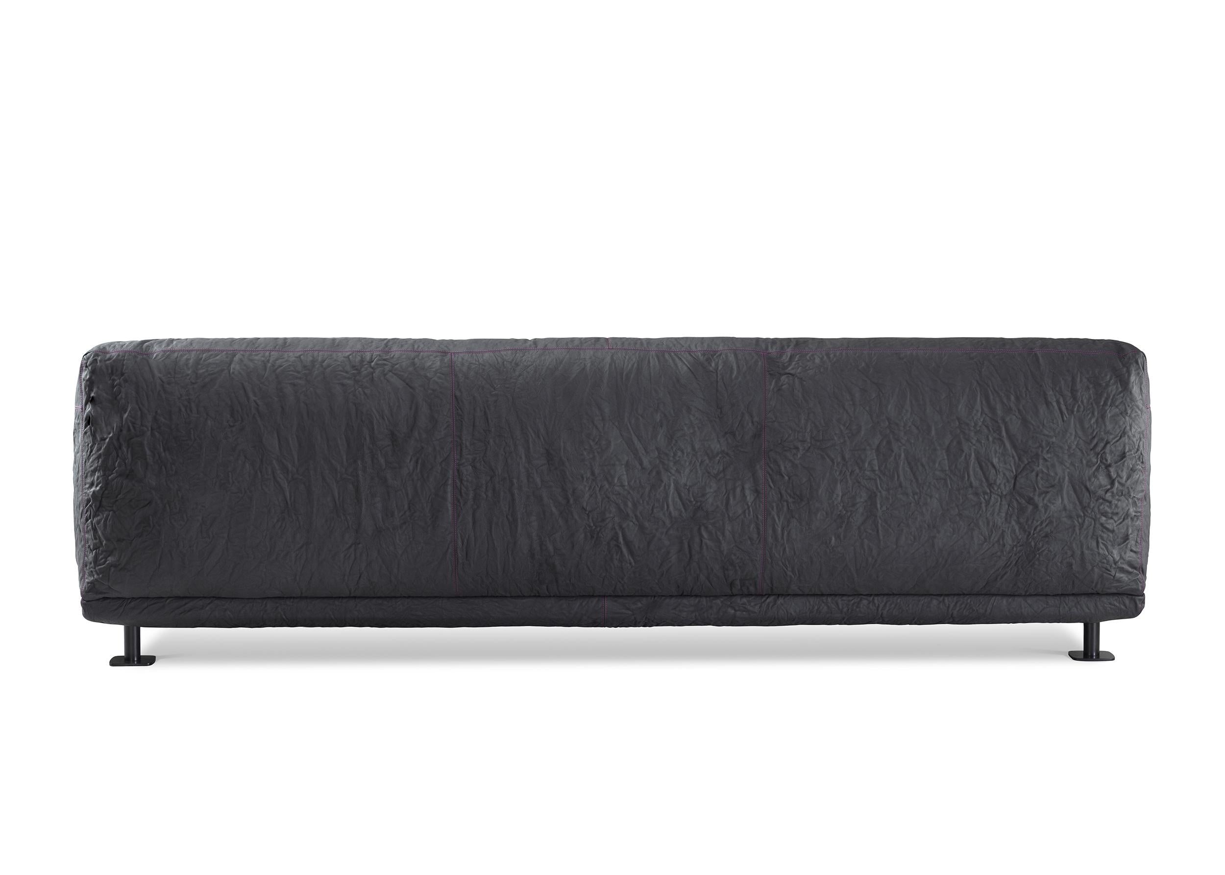 https://a.1stdibscdn.com/newcastle-262-leather-sofa-slate-magenta-by-giulio-iacchetti-for-sale-picture-2/56838172/f_445318721744725633464/Newcastle_262_Leather_Sofa_Slate_Magenta_by_Giulio_Iacchetti_2_master.jpg