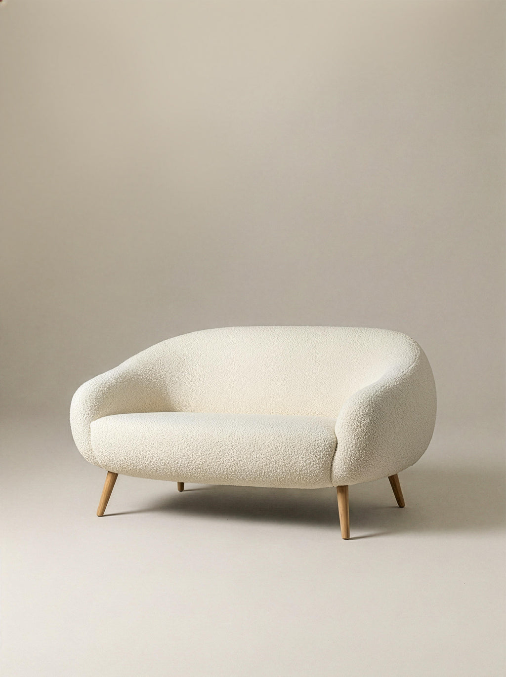 https://a.1stdibscdn.com/mid-century-modern-round-white-boucle-oak-handmade-niemeyer-sofa-by-insidherland-for-sale-picture-6/f_53652/f_218196221776172075332/Niemeyer_2_seat_sofa_by_InsidherLand_master.jpg