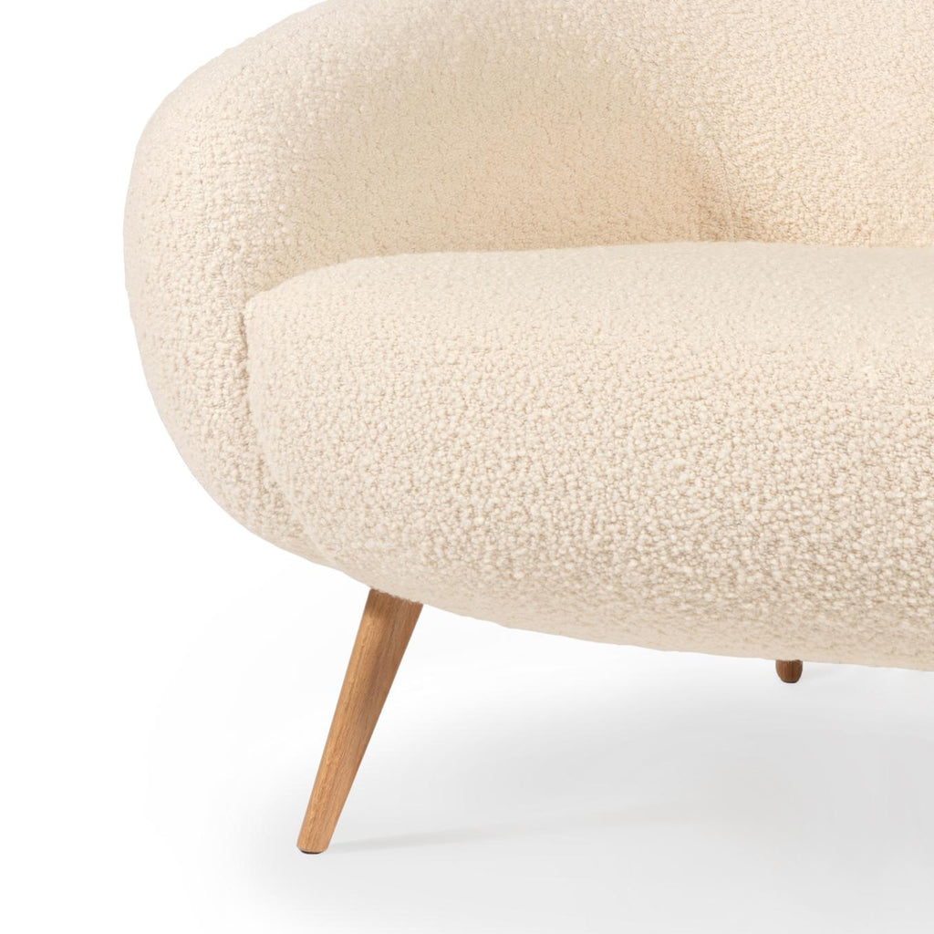 https://a.1stdibscdn.com/niemeyer-2-seat-sofa-boucle-and-oak-insidherland-by-joana-santos-barbosa-for-sale-picture-3/f_53652/f_218196221608119005019/Niemeyer_2_seat_sofa_woollen_03_InsidherLand_master.jpg