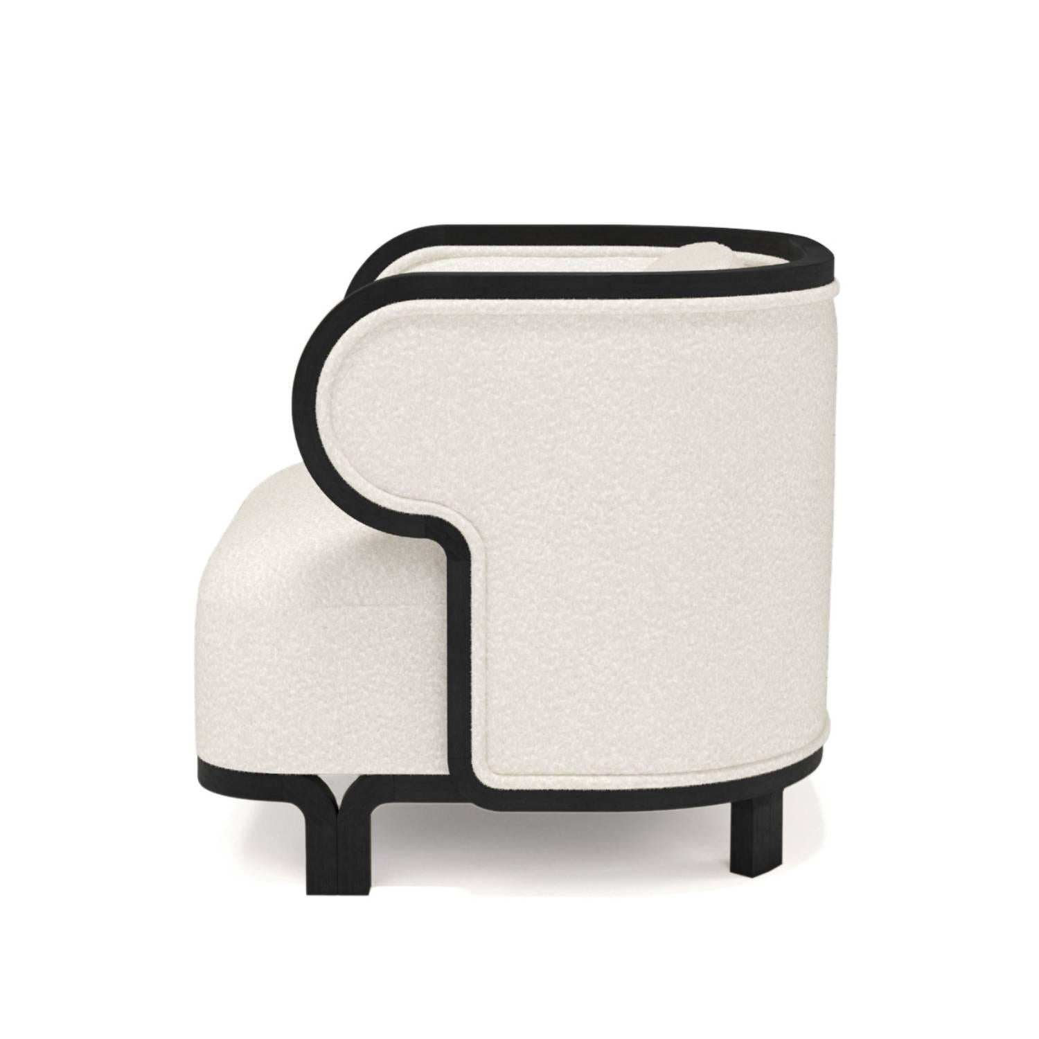 https://a.1stdibscdn.com/odette-curvy-club-chair-with-black-oak-wood-frame-by-fredjuul-for-sale-picture-2/f_22063/f_274861321683811374844/ODETTEcbw_side_2__master.jpg