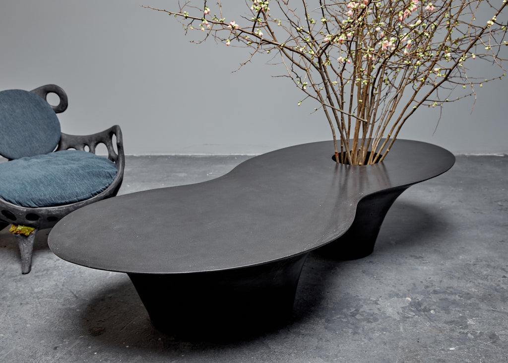 https://a.1stdibscdn.com/opiary-concrete-island-coffee-table-for-sale-picture-8/f_48222/f_198607221614358985458/OPIARY_D2_ISLAND_COFFEE_TABLE_STROBE_352_1__master.jpg