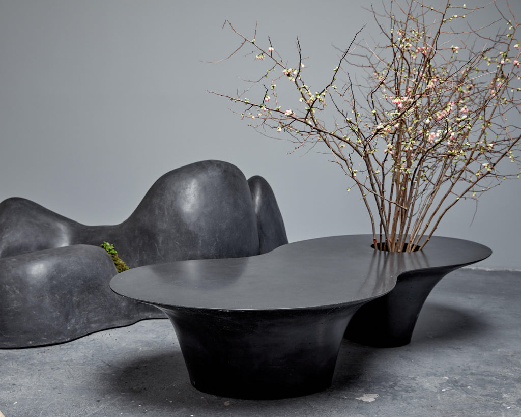 https://a.1stdibscdn.com/opiary-concrete-island-coffee-table-for-sale-picture-7/f_48222/f_198607221614358972383/OPIARY_D2_ISLAND_COFFEE_TABLE_STROBE_371_1__master.jpg