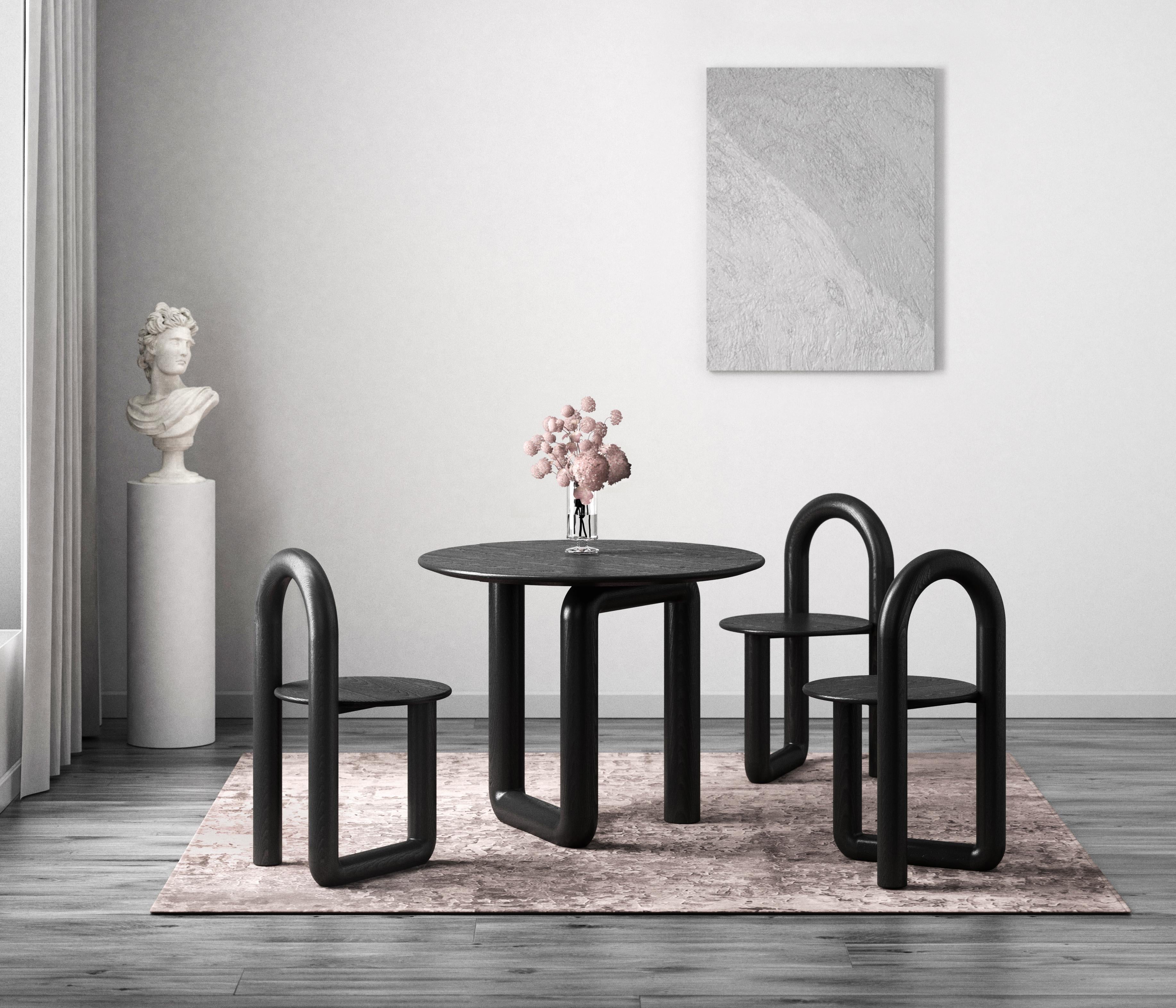 https://a.1stdibscdn.com/round-dining-table-in-ebonized-ash-by-objects-ideas-for-sale-picture-6/f_37133/f_190202821589161459968/ObjectsandIdeas_MonoCollection2_master.jpg