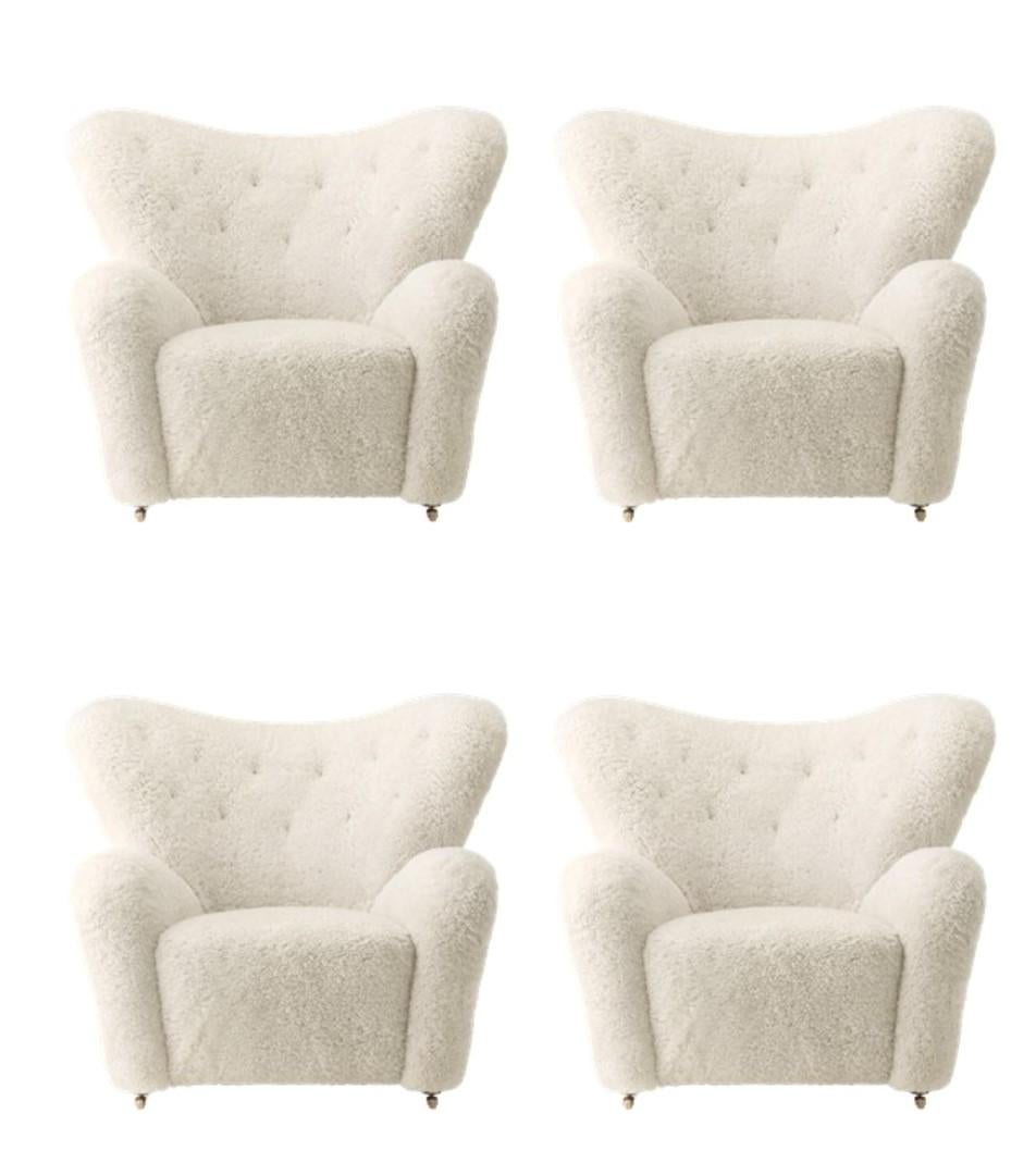 https://a.1stdibscdn.com/set-of-4-off-white-sheepskin-the-tired-man-lounge-chair-by-lassen-for-sale-picture-2/f_12192/f_329311121677159369679/Off_White_x4_master.jpg