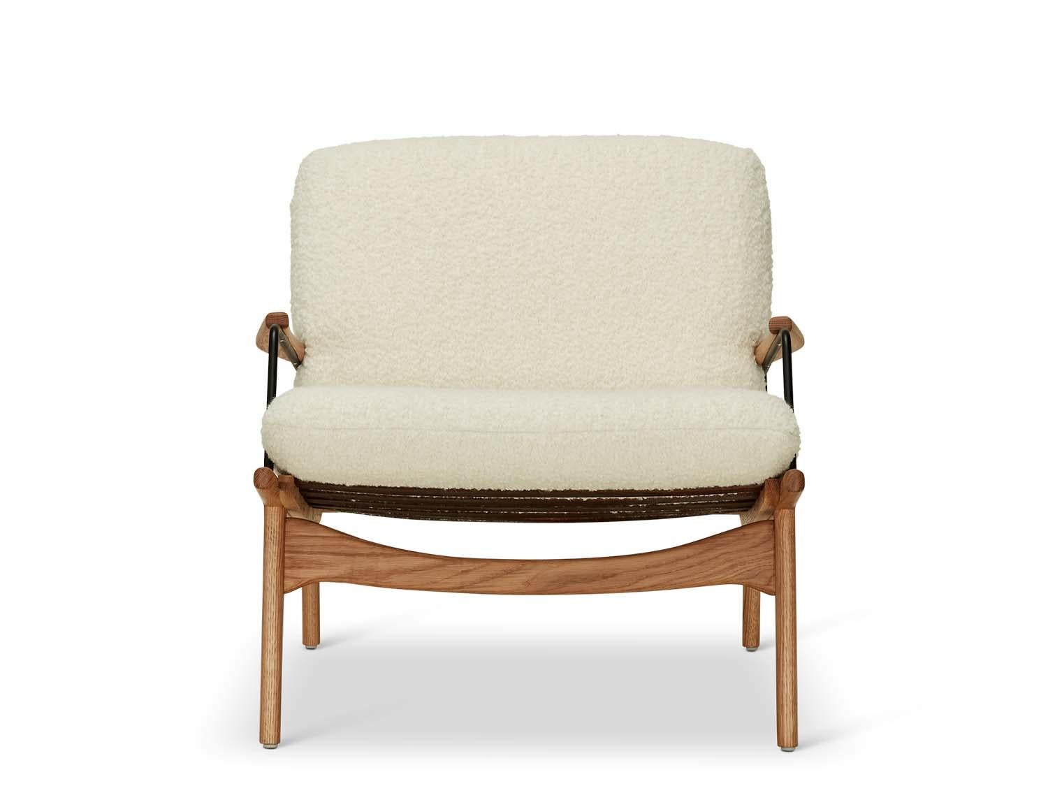 https://a.1stdibscdn.com/lawson-fenning-makers-armchair-solid-oak-white-boucle-modern-lounge-chair-for-sale-picture-2/f_8060/f_494627521774978240382/Oiled_Oak_Brown_leather_Antique_Brass_Grd_D_Boucle_Ivory1_master.jpg
