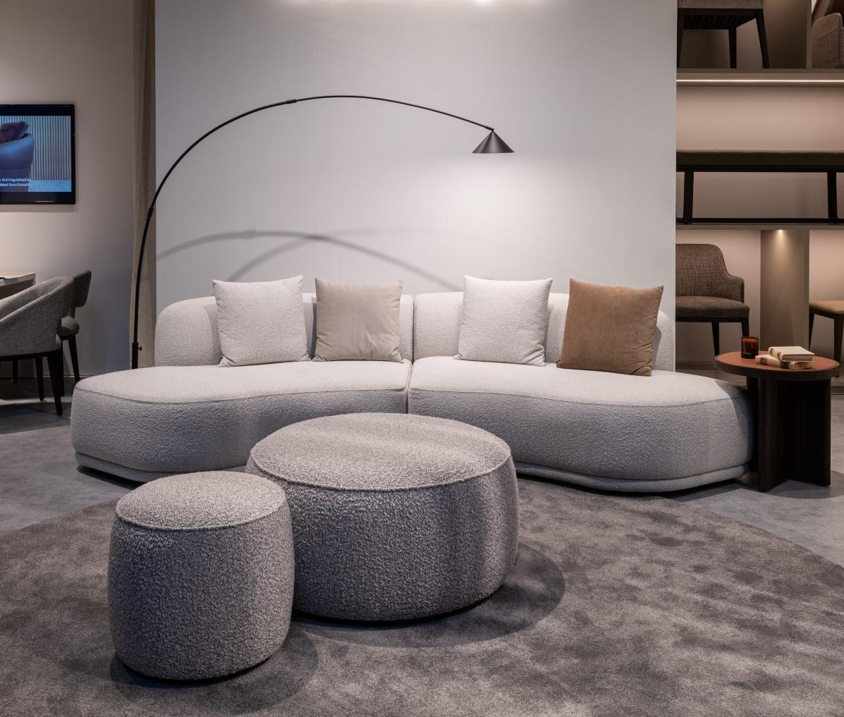 https://a.1stdibscdn.com/modular-rounded-bulky-sofa-with-upholstered-footer-for-sale-picture-4/f_27693/f_398405621716434480604/Olivia_Sofa_at_salone_del_mobile_master.jpg