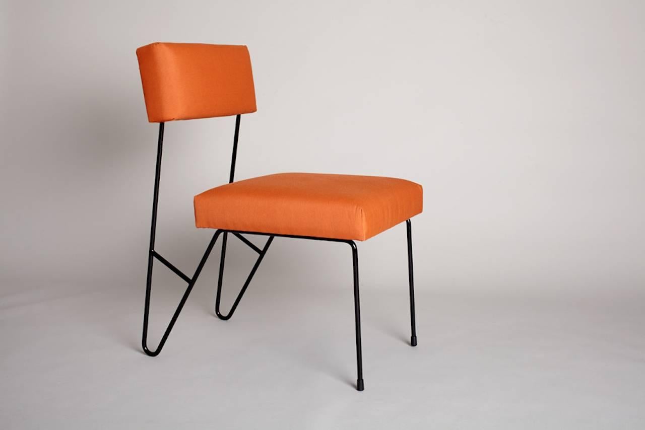 https://a.1stdibscdn.com/archivesE/upload/f_27603/f_80416431500312362972/Orange_Dining_Chair_master.jpg
