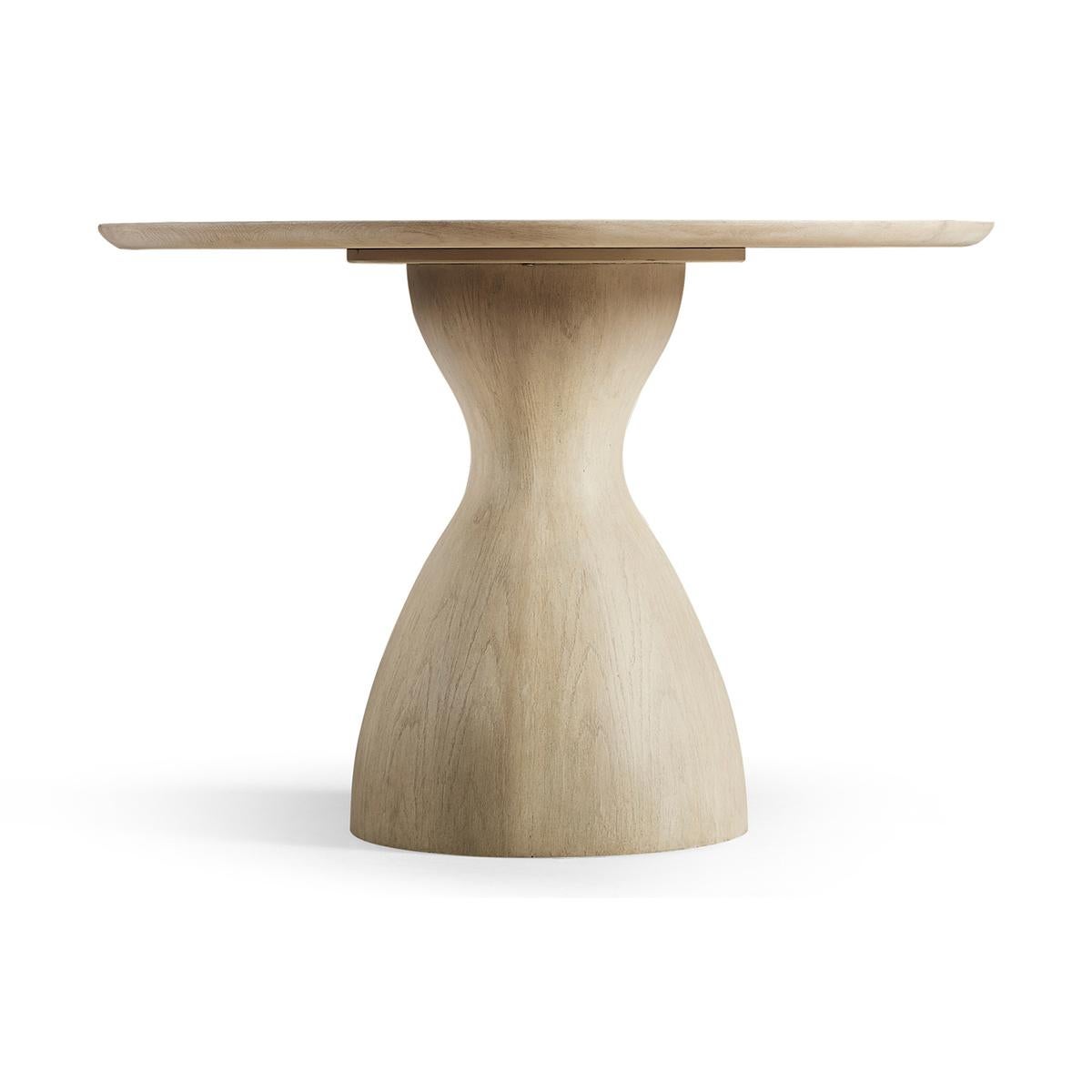 https://a.1stdibscdn.com/organic-modern-oak-pedestal-dining-table-for-sale-picture-2/f_8038/f_316091521670304284190/Organic_Modern_Oak_Pedestal_Dining_Table_2_master.jpg