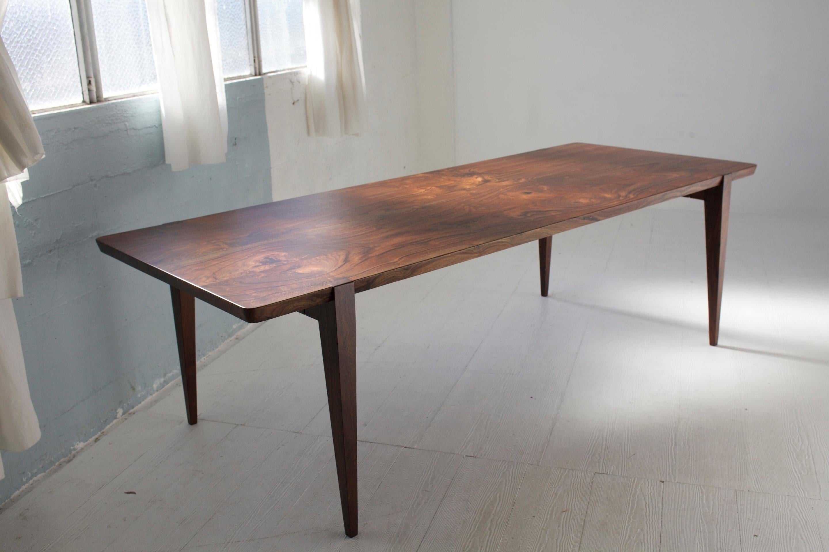 https://a.1stdibscdn.com/84-oslo-dining-table-in-oregon-walnut-by-studio-moe-for-sale-picture-5/f_51932/f_183215121584250621703/Oslo_Oregon_walnut_dining_table_master.jpg