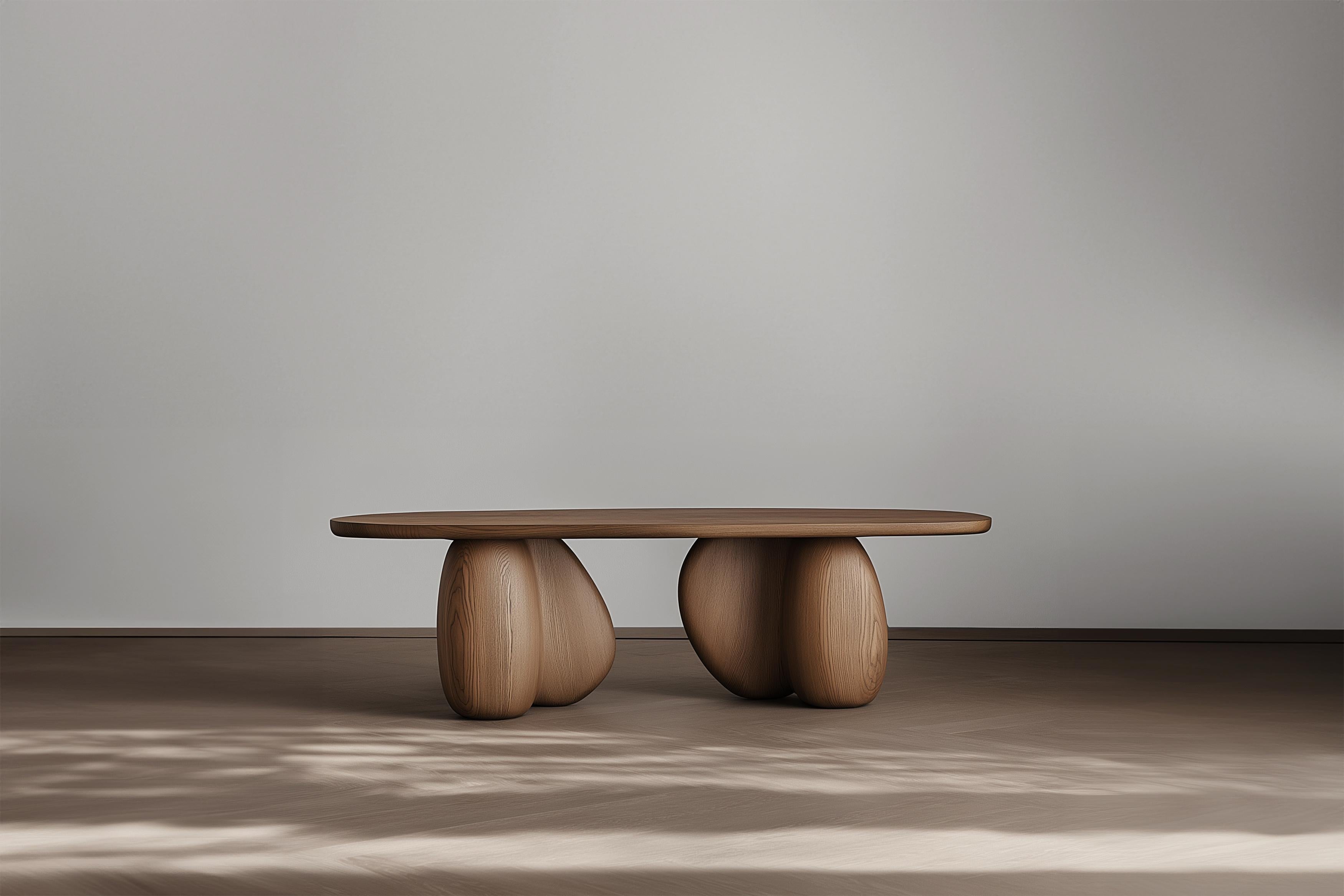 https://a.1stdibscdn.com/oval-coffee-table-serie-83-sereno-by-nono-with-sculptural-pebble-legs-for-sale-picture-2/f_39563/f_438116721740589610728/Oval_Coffee_Table_Serie_83_Sereno_by_NONO_with_Sculptural_Pebble_Legs_2_master.jpg