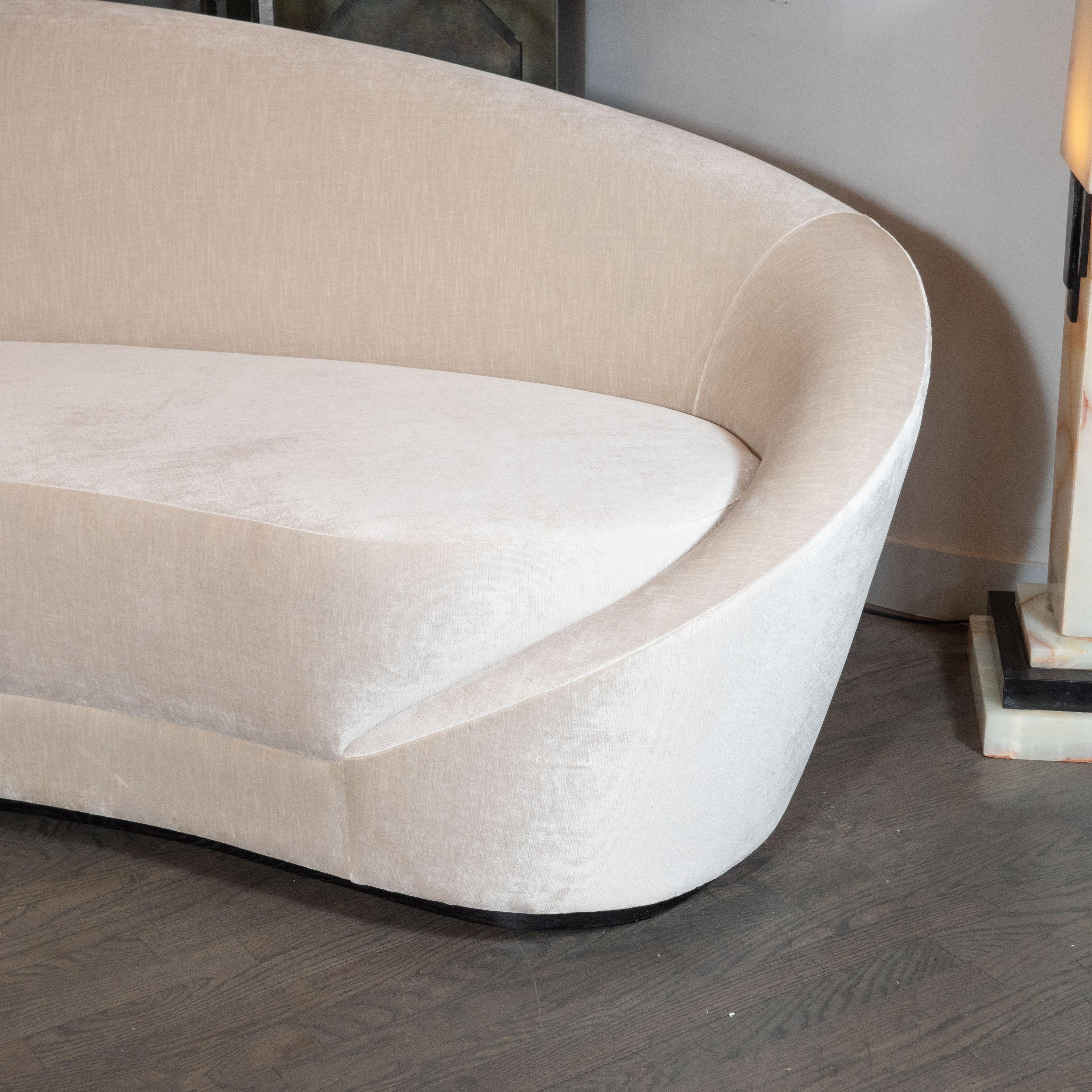 https://a.1stdibscdn.com/1940s-style-modernist-sweeping-curved-sofa-in-oyster-velvet-by-high-style-deco-for-sale-picture-3/f_7934/1585067005771/P1044977_master.jpg