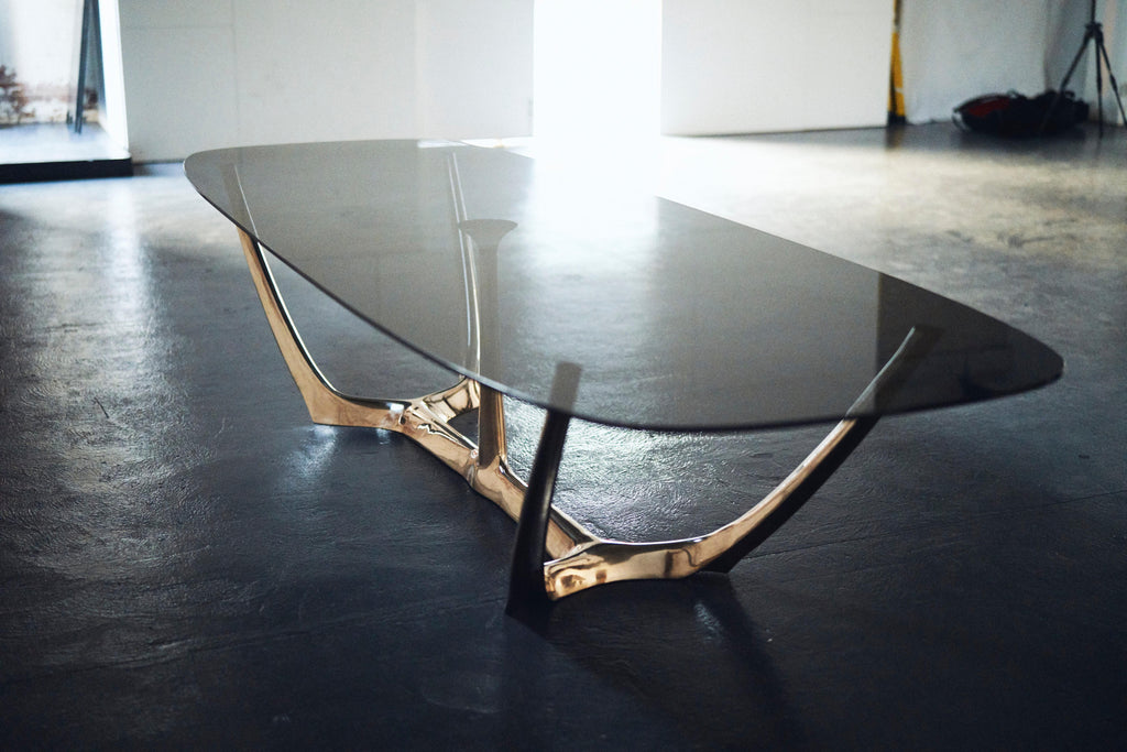 https://a.1stdibscdn.com/barbera-the-great-dining-table-modern-solid-bronze-base-with-grey-glass-top-for-sale-picture-5/f_45601/f_151482421560952967802/PAUL_BARBERA_PB209570_master.jpg
