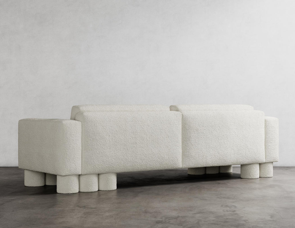 https://a.1stdibscdn.com/pillar-sofa-modern-design-in-soft-white-boucle-for-sale-picture-4/f_33283/f_367597521698104626413/PILLAR_SOFA_2_1ST_DIBS_CROPS_master.jpg