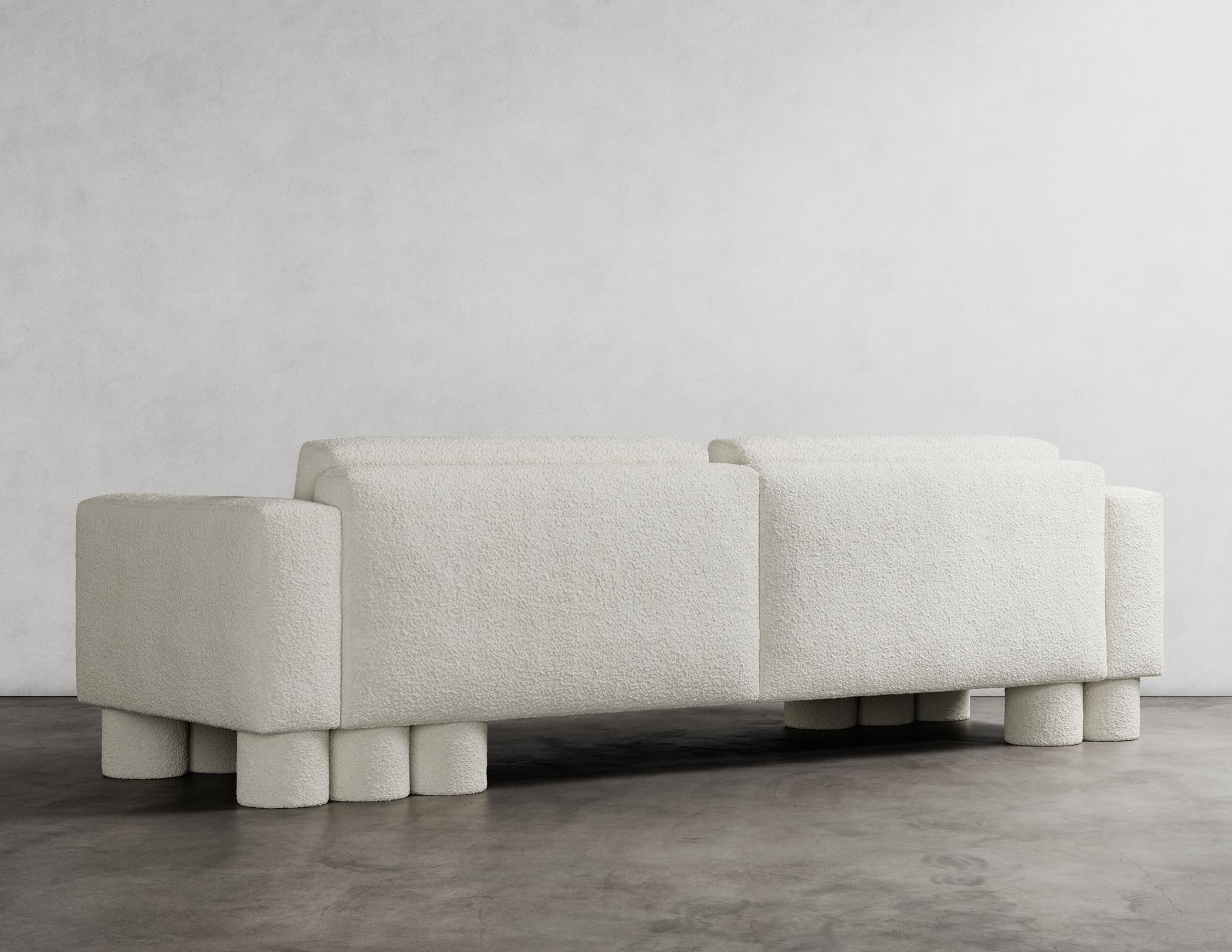 https://a.1stdibscdn.com/pillar-sofa-modern-design-in-soft-white-boucle-for-sale-picture-4/f_33283/f_367597521698104626413/PILLAR_SOFA_2_1ST_DIBS_CROPS_master.jpg
