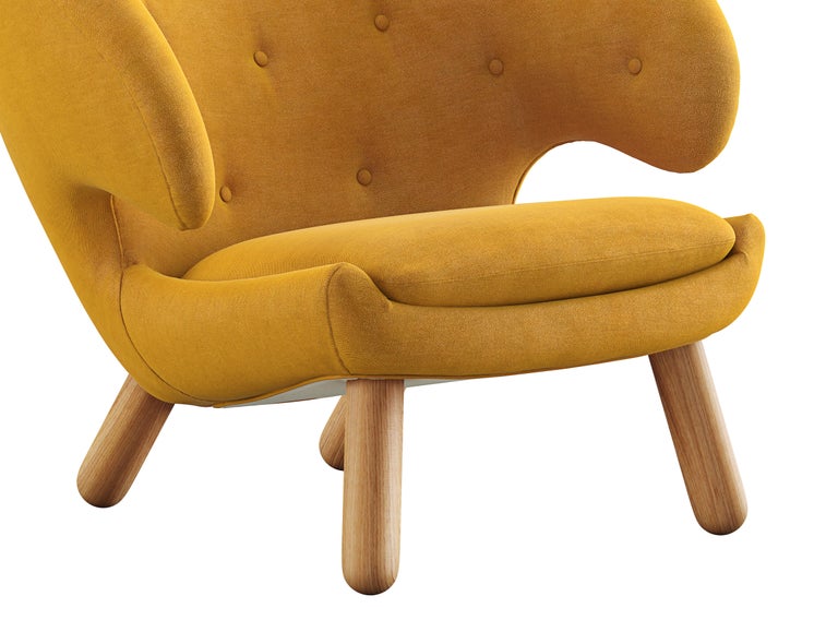 https://a.1stdibscdn.com/finn-juhl-pelican-chair-upholstered-in-wood-and-fabric-for-sale-picture-6/f_14272/f_378351021704703898440/POCR3_master.jpg?width=768