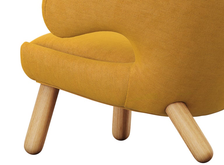 https://a.1stdibscdn.com/finn-juhl-pelican-chair-upholstered-in-wood-and-fabric-for-sale-picture-8/f_14272/f_378351021704703901357/POCR5_master.jpg?width=768