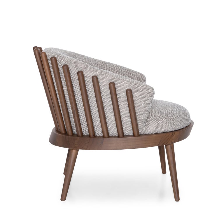 https://a.1stdibscdn.com/customizable-walnut-finish-and-grey-boucle-accent-armchair-fane-collection-for-sale-picture-3/f_52822/f_434149521738327521526/POLTRONA_MAD_9816_FANE_154MT_2516_A8_EXP_3_master.jpg?width=768