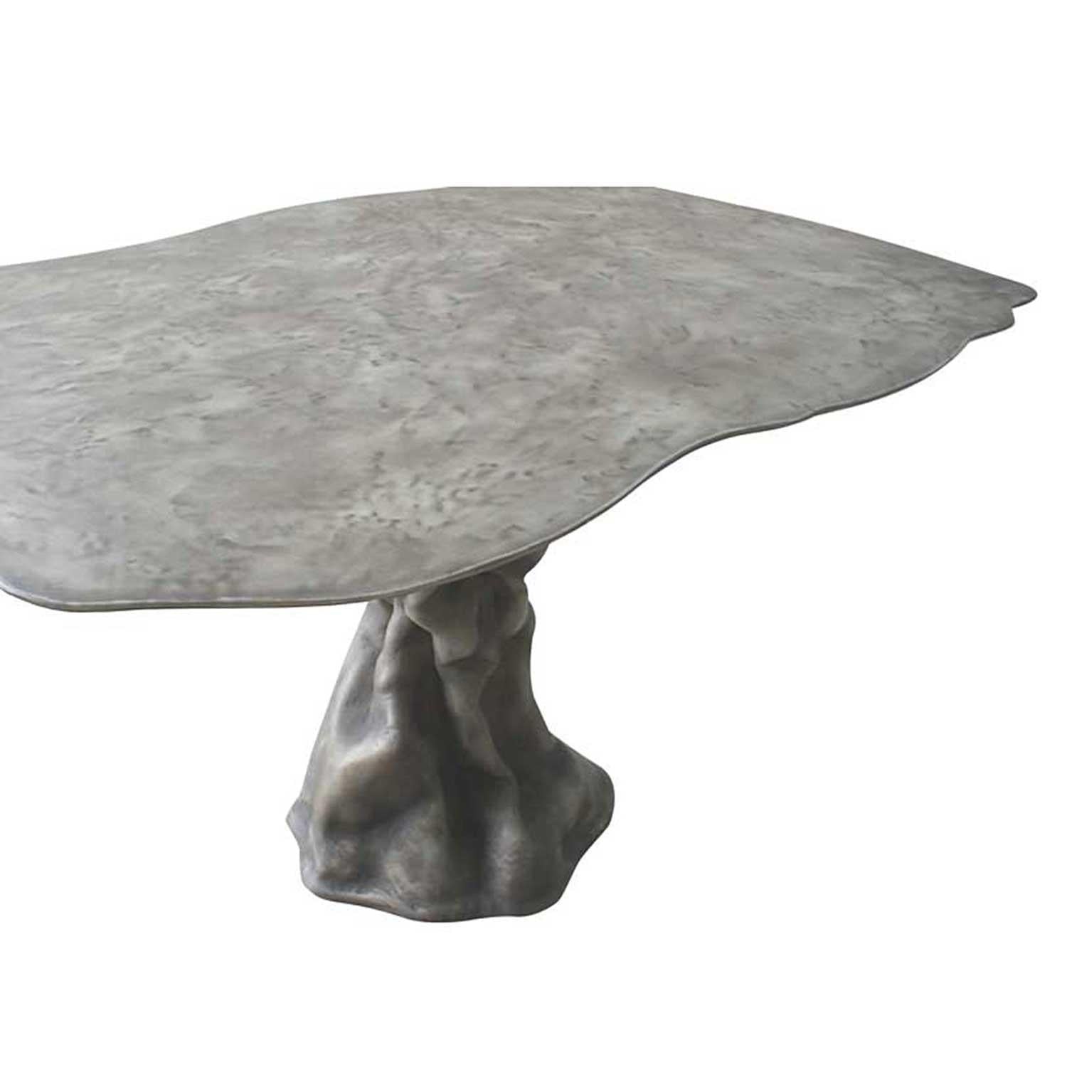 https://a.1stdibscdn.com/outdoor-organic-shaped-dining-table-in-white-lacquer-for-sale-picture-2/f_27693/f_262991821637992458735/PORTHOS_dining_table_Outdoor_aged_Fiberglass_Karpa_DESSAIVE_selected_interior_design_master.jpg