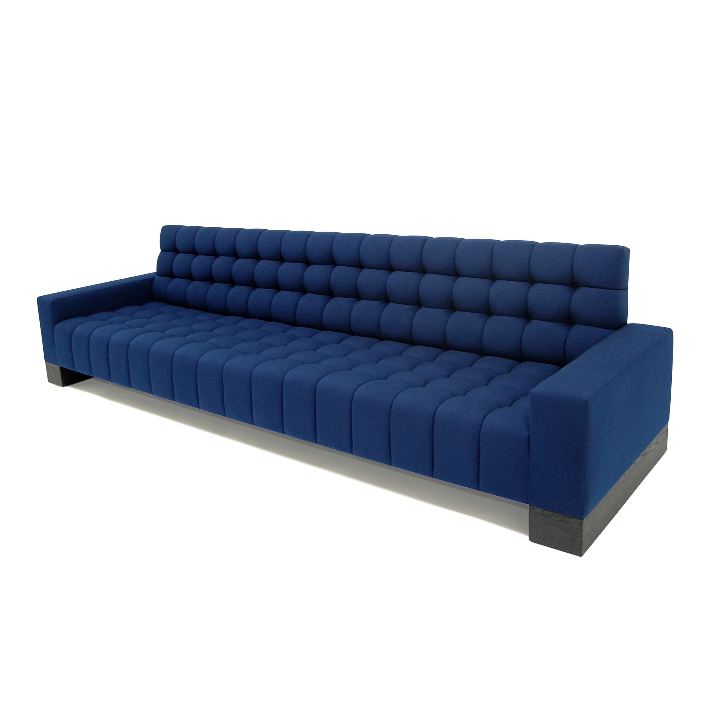 https://a.1stdibscdn.com/abyss-sofa-channeling-deep-tufted-wood-block-base-blue-custom-for-sale-picture-4/f_31463/f_420063321729698807819/PO_2794_CRA_AbyssSofa2Arms_DSC_0407FINAL_master.jpg