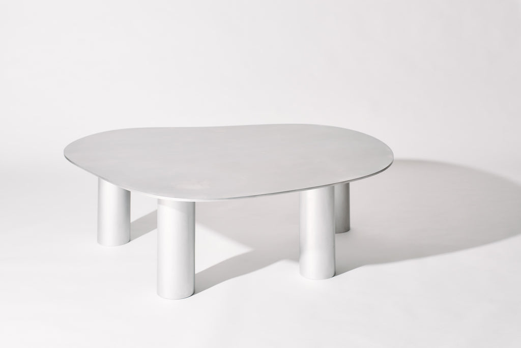 https://a.1stdibscdn.com/the-puddle-table-collection-large-aluminum-coffee-table-with-cylinder-legs-for-sale-picture-2/f_28533/f_398230821716331000082/PUDDLE_SESSION1347_master.jpg