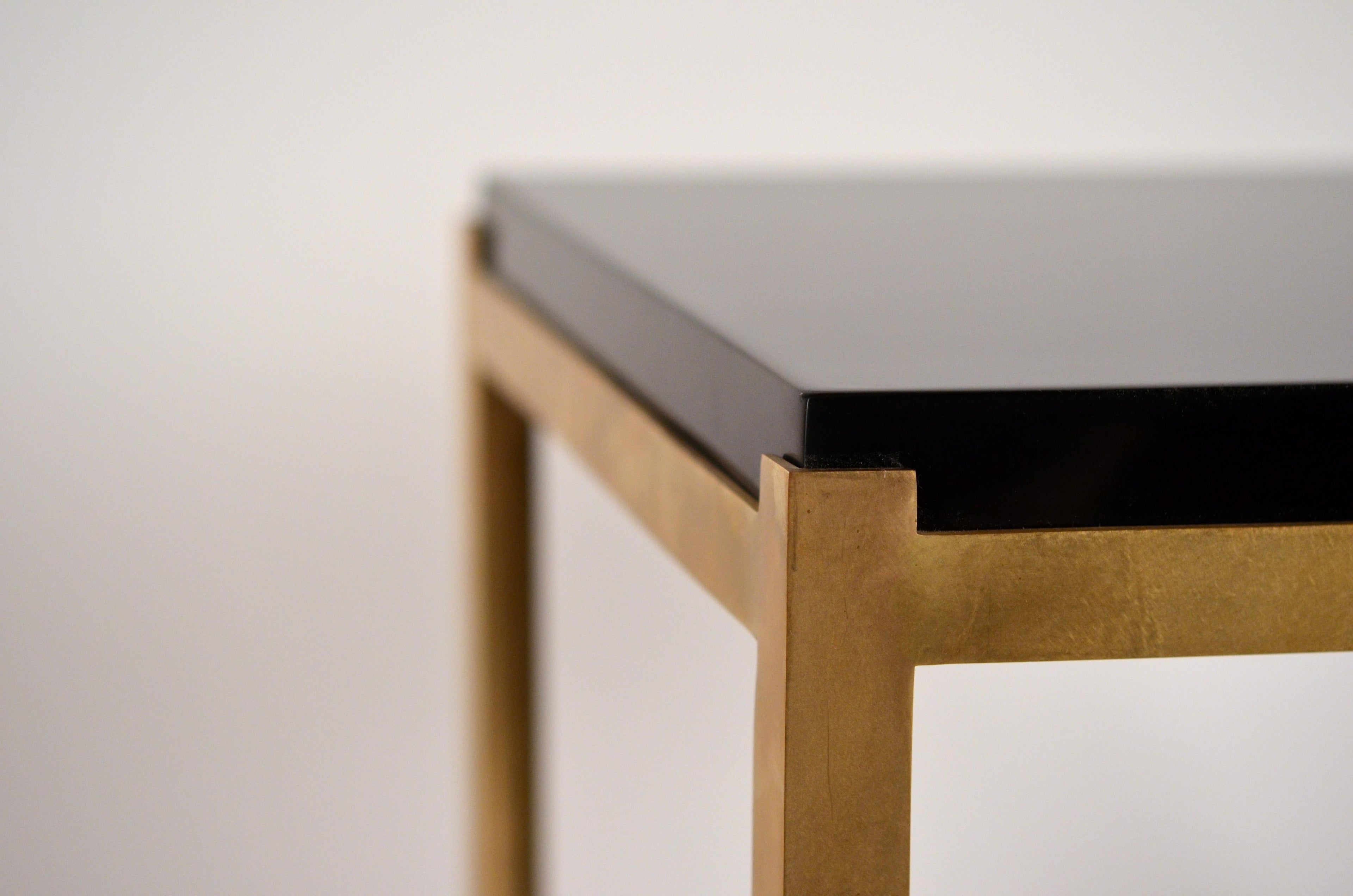 https://a.1stdibscdn.com/pair-of-chic-caisson-solid-brass-and-black-lacquer-end-tables-by-design-freres-for-sale-picture-4/f_8184/f_222311821611348407541/Pair_custom_Caisson_tables_new_4__master.JPG
