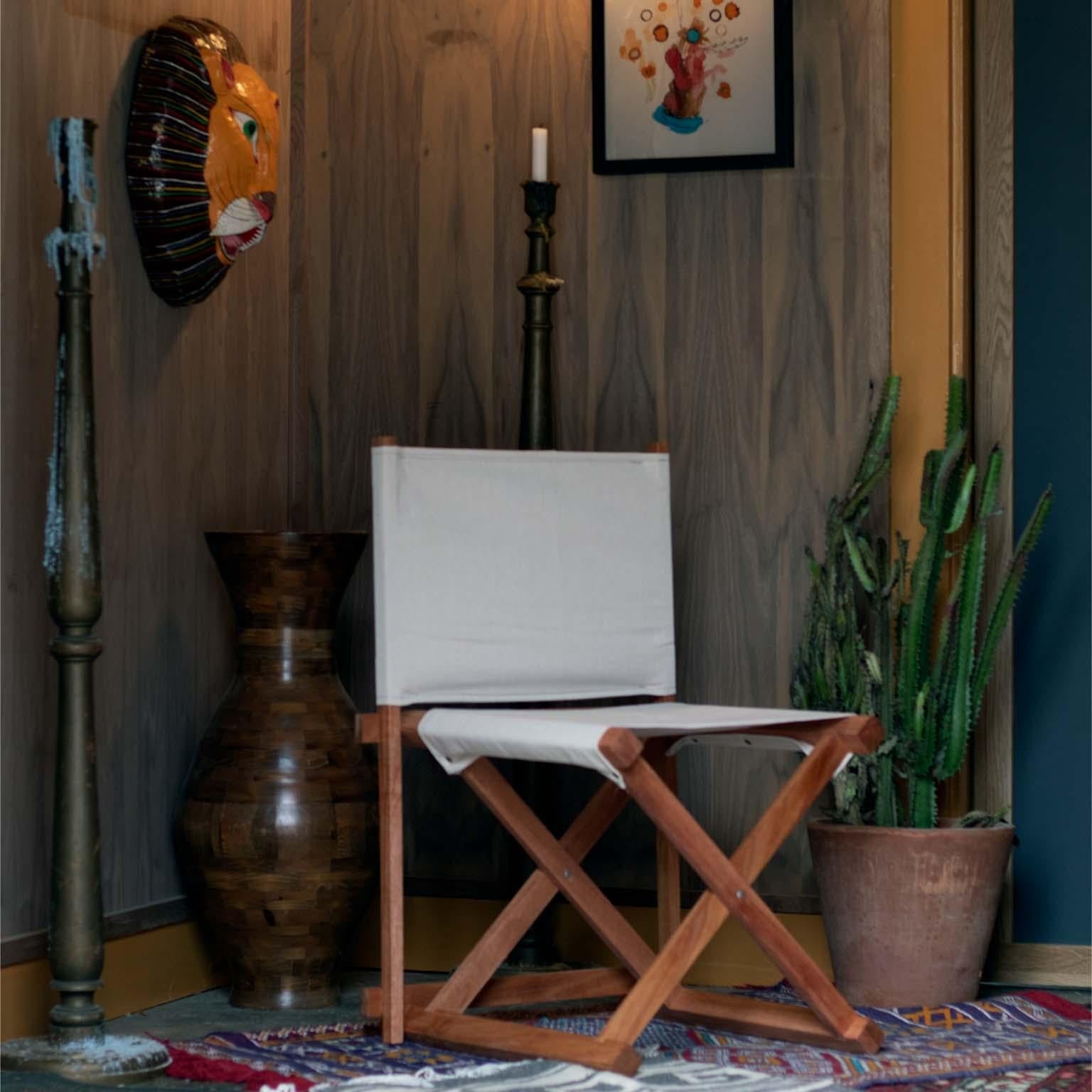 https://a.1stdibscdn.com/paolo-mahogany-and-canvas-folding-directors-chair-for-sale-picture-2/f_48391/f_279941621648506826168/Paolo_Style_master.jpg