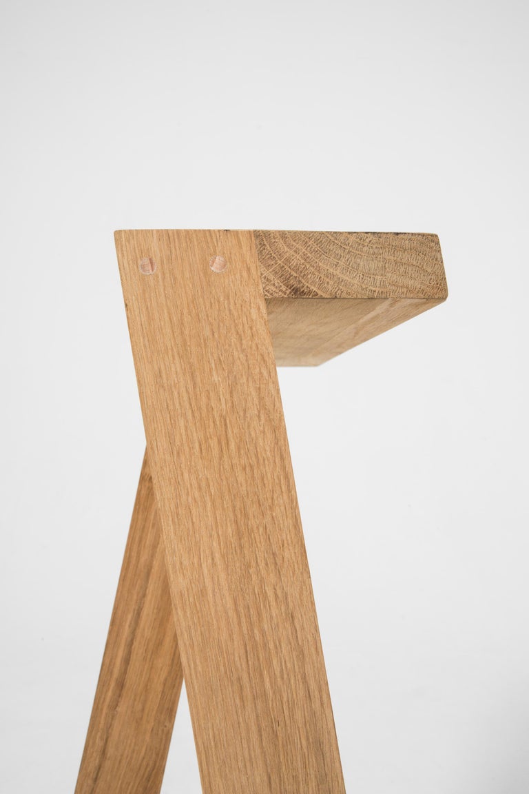 https://a.1stdibscdn.com/set-of-2-small-pausa-oak-stool-by-pierre-emmanuel-vandeputte-for-sale-picture-5/f_12192/f_345208321685452355291/Pausa_stool_MikoMikoStudio_34_master.jpg?width=768