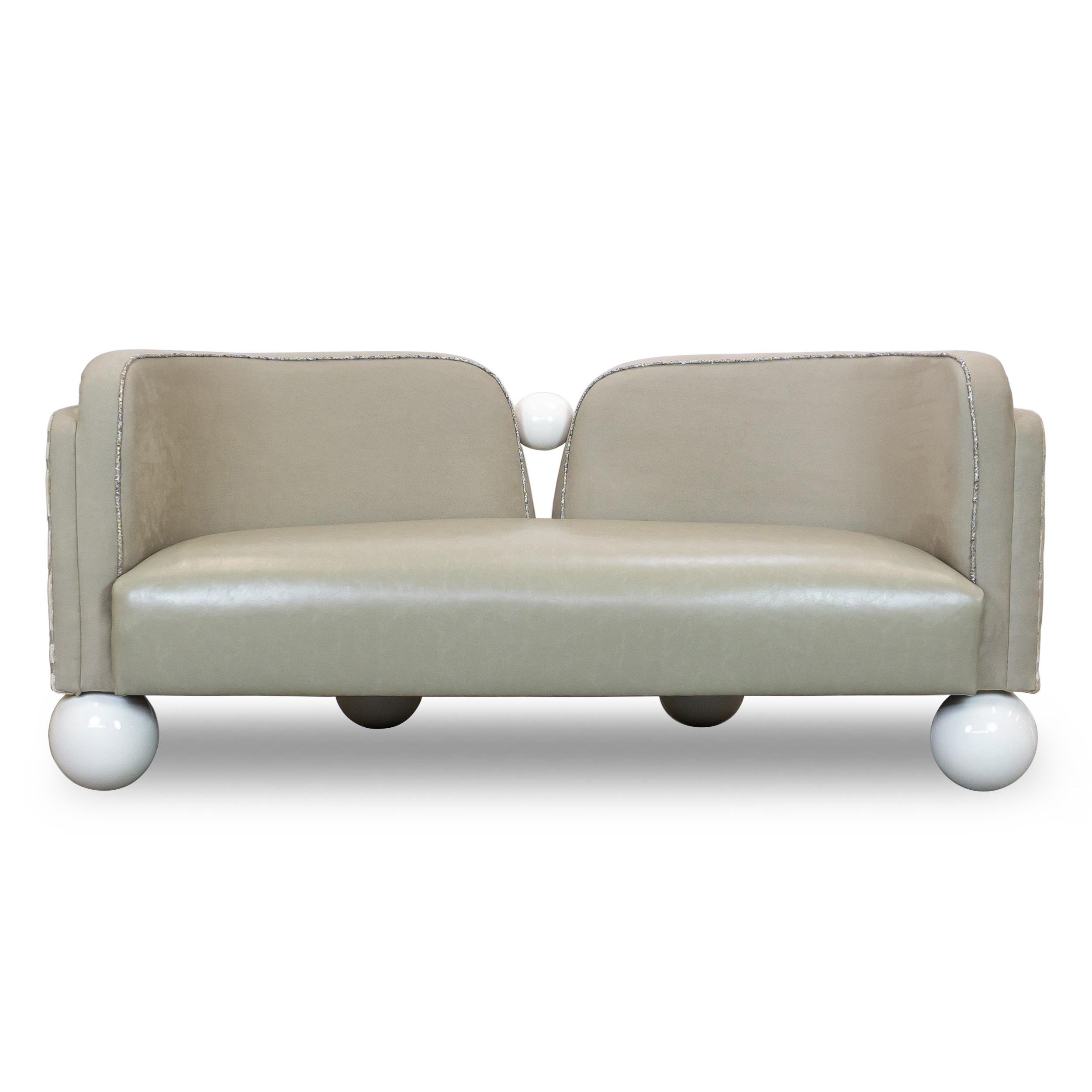 https://a.1stdibscdn.com/tete-a-tete-style-sofa-with-art-deco-influence-and-pearl-like-feet-for-sale-picture-2/f_21233/f_461512421754409568962/Pearl_Banquette_0001_1_master.jpg