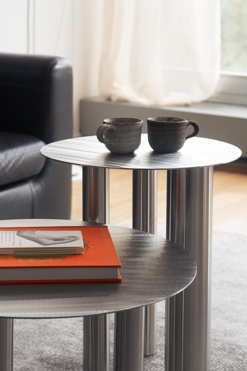 https://a.1stdibscdn.com/sculptural-brandt-high-coffee-table-cs1-in-hand-brushed-stainless-steel-by-noom-for-sale-picture-17/f_42321/f_185527621774017870270/Photo_5_master.jpg