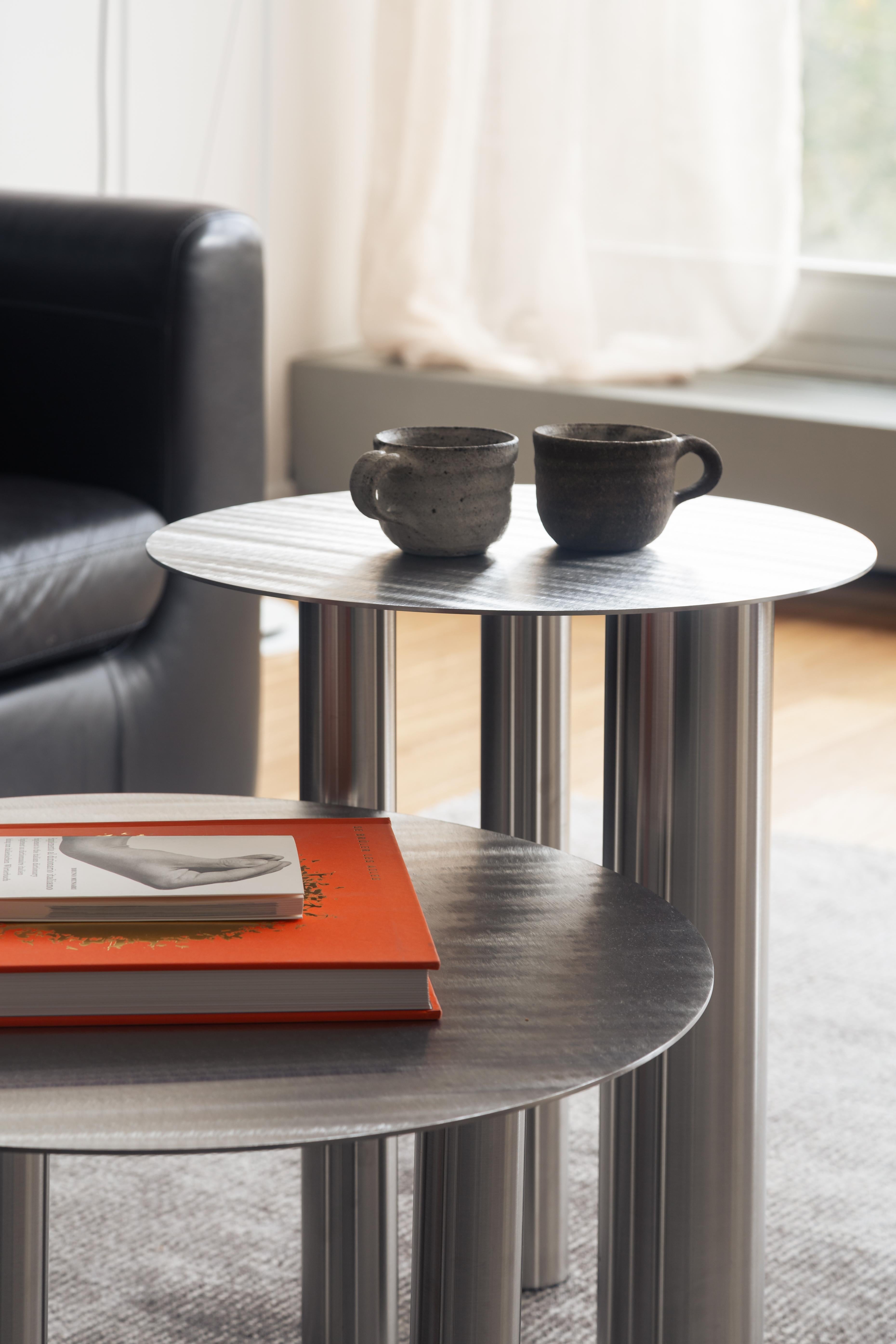 https://a.1stdibscdn.com/sculptural-brandt-high-coffee-table-cs1-in-hand-brushed-stainless-steel-by-noom-for-sale-picture-17/f_42321/f_185527621774017870270/Photo_5_master.jpg