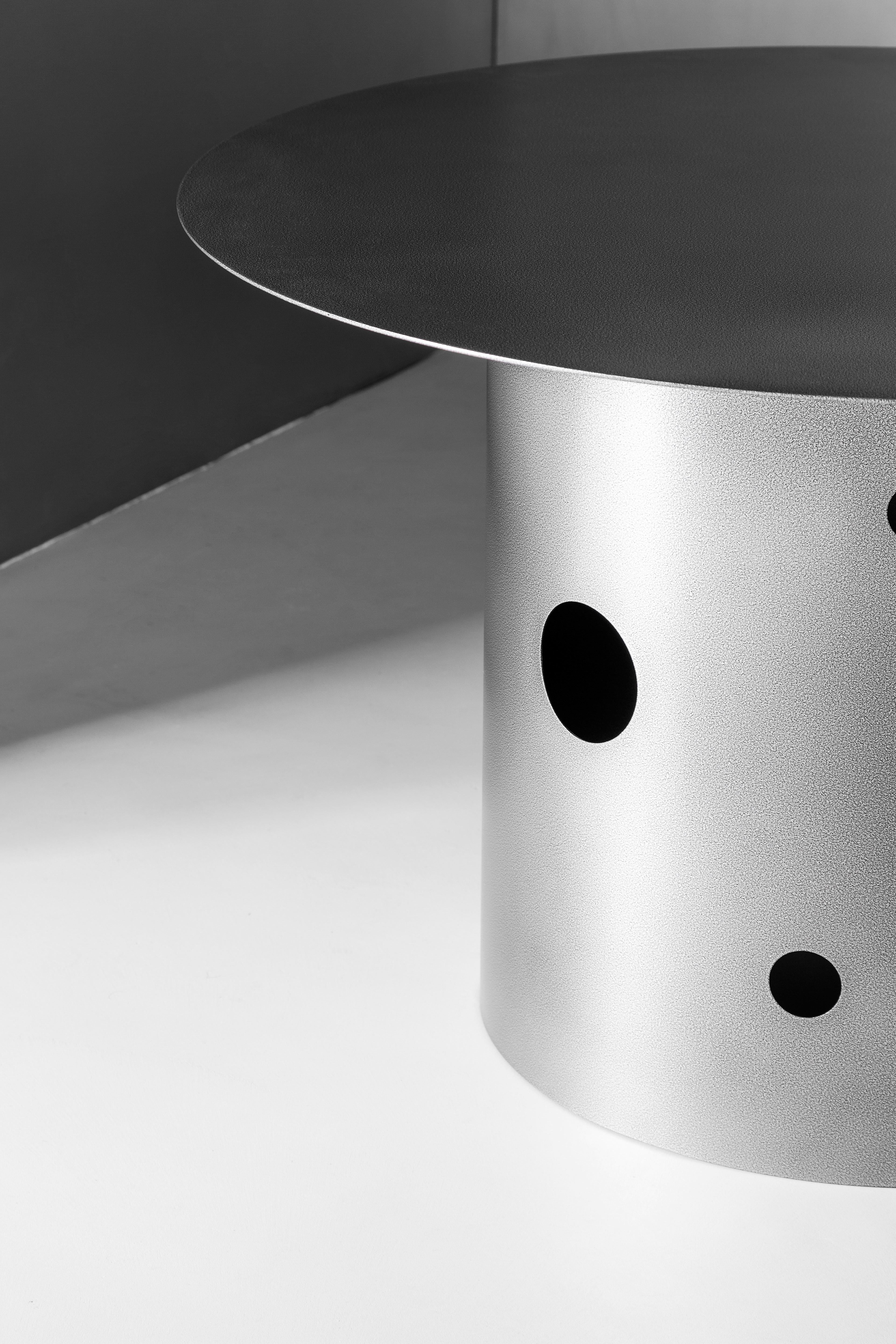 https://a.1stdibscdn.com/contemporary-21st-century-silos-dining-table-by-spinzi-in-hammered-gunmetal-grey-for-sale-picture-3/32076752/f_378902921704970947625/PietraStudio_SpinziSalone22_23_master_master.jpg