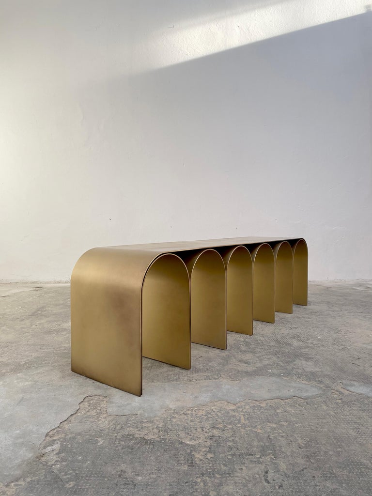 https://a.1stdibscdn.com/steel-gold-arch-bench-by-pietro-franceschini-for-sale-picture-4/f_12192/f_332925121678818422826/Pietro_Franceschini_Gold_Arch_Bench_Steel_Brass_Finish_08b_master.JPG?width=768
