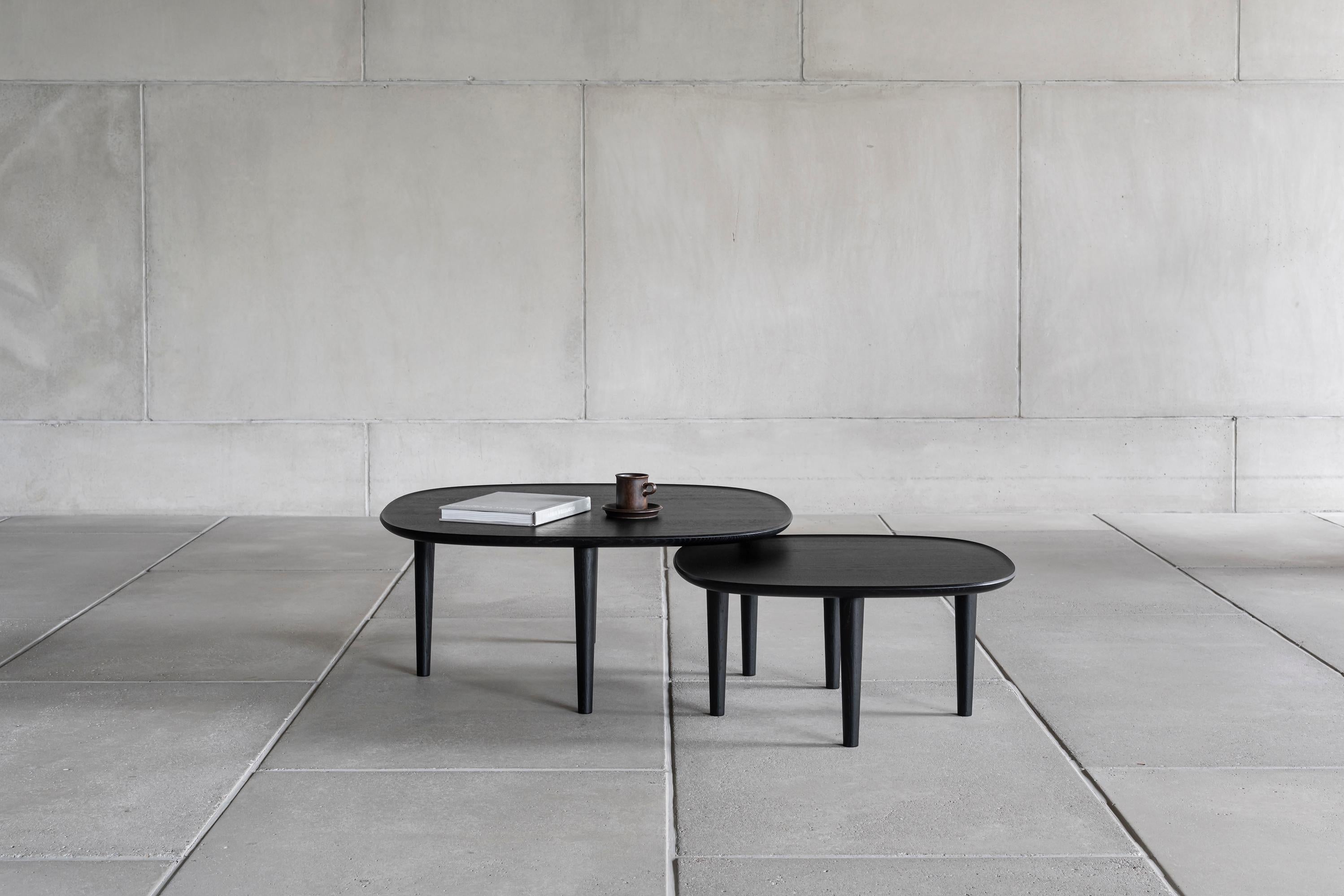 https://a.1stdibscdn.com/scandinavian-modern-fiori-table-65-by-antrei-hartikainen-x-poiat-oak-for-sale-picture-3/f_31233/f_315242321669812827658/Poiat_Fiori_tables_black_2_master.jpg