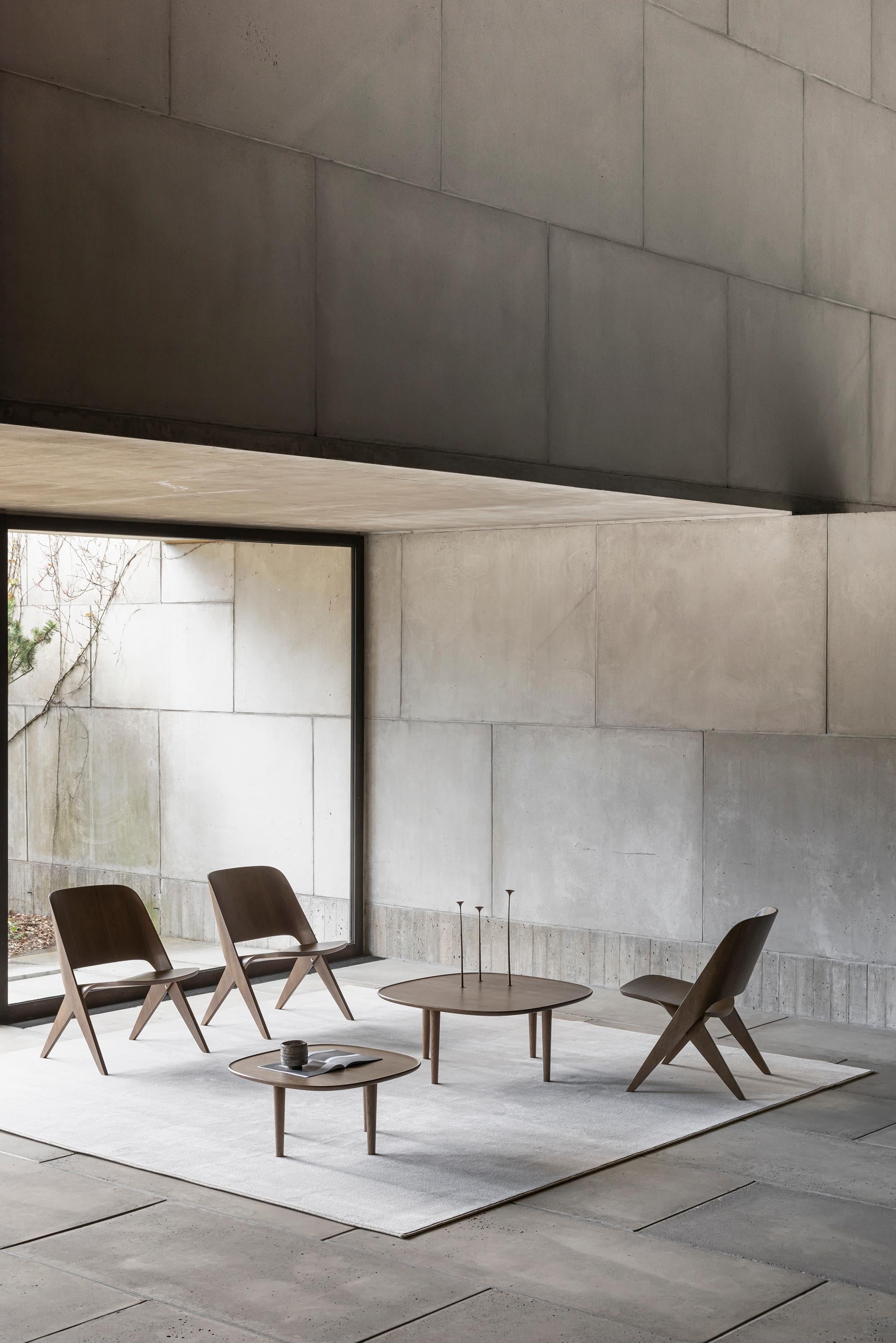 https://a.1stdibscdn.com/scandinavian-modern-fiori-table-85-by-antrei-hartikainen-x-poiat-oak-for-sale-picture-6/f_31233/f_315219621669807173029/Poiat_Fiori_tables_dark_oak_2_master.jpg