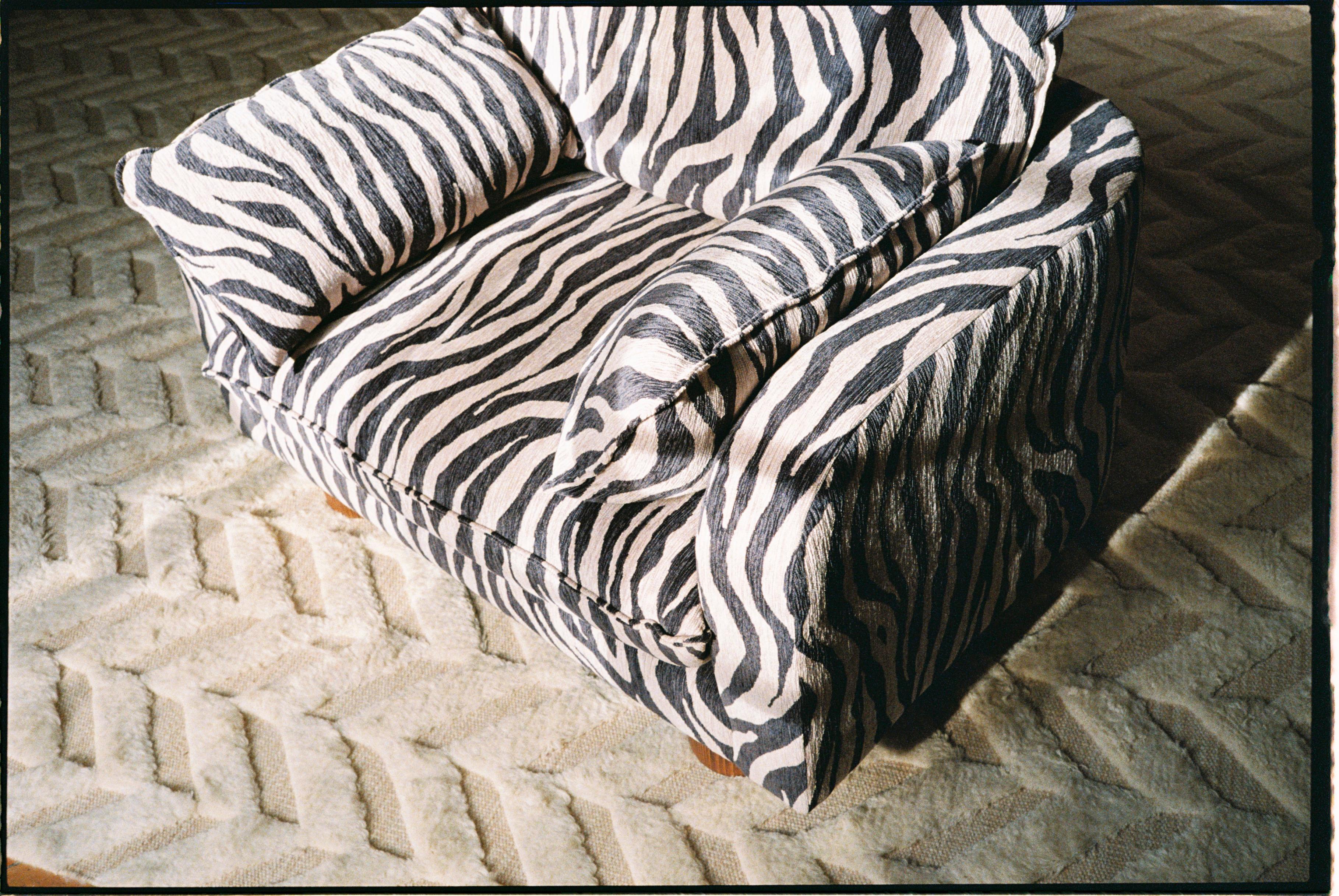 https://a.1stdibscdn.com/zebra-patterned-upholstered-loveseat-model-miles-for-sale-picture-9/f_58912/f_442129121771267756886/R1_07834_0012_master.jpeg