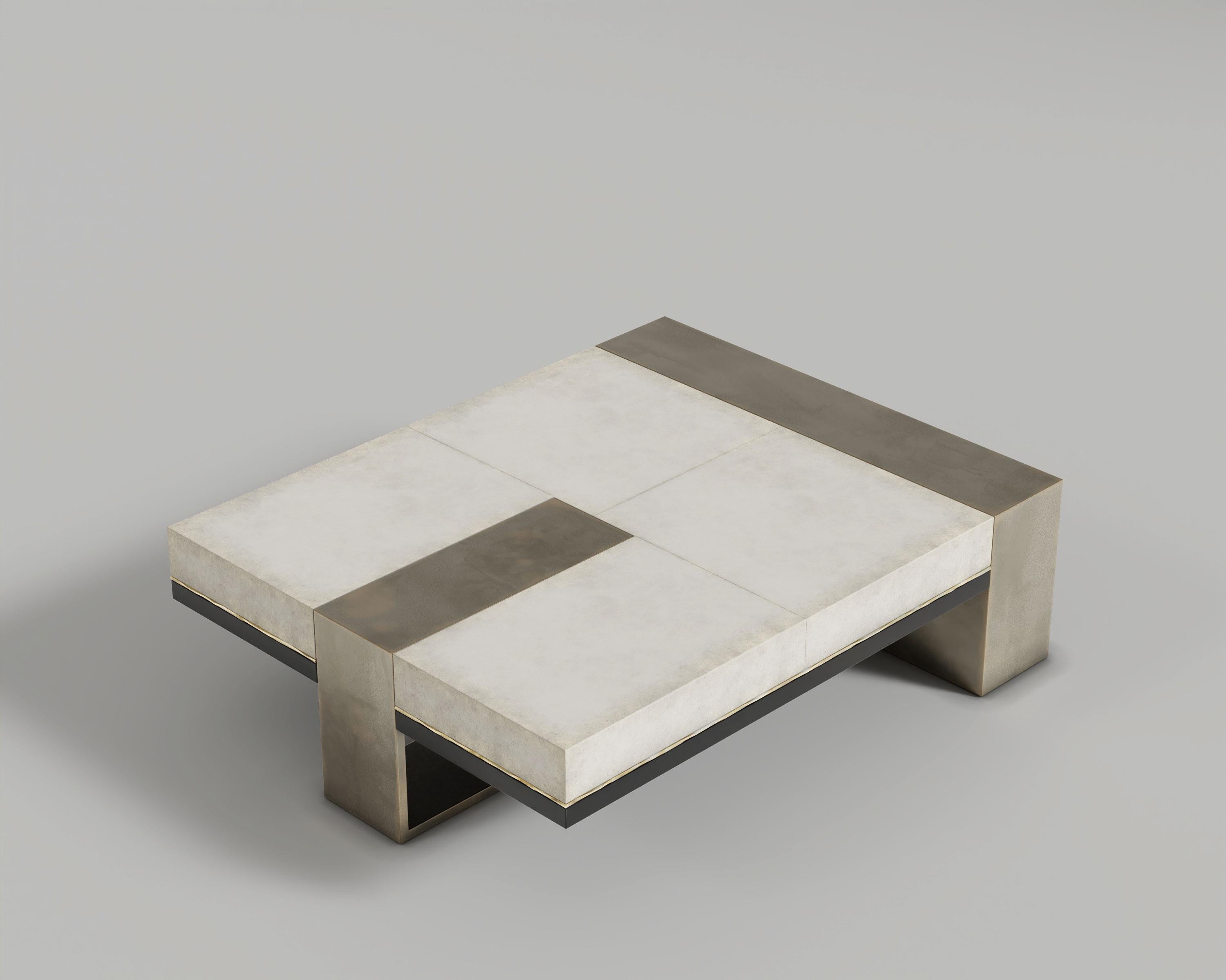 https://a.1stdibscdn.com/radice-goatskin-coffee-table-by-palena-furniture-for-sale-picture-6/f_12192/f_484139221768925760336/RADICE_COFFEE_TABLE_PATINA_BRONZE_POLISHED_BRONZE_GOATSKIN_BLACK_LACQUER_4__master.jpg