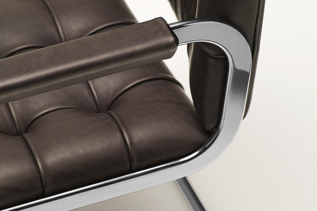https://a.1stdibscdn.com/de-sede-rh-305-armchair-in-truffe-fabric-with-chrome-finish-by-robert-haussmann-for-sale-picture-2/22569652/f_324055521674637658323/RH_0305_02_rh_305_5_PS_chrome_master_master.jpg